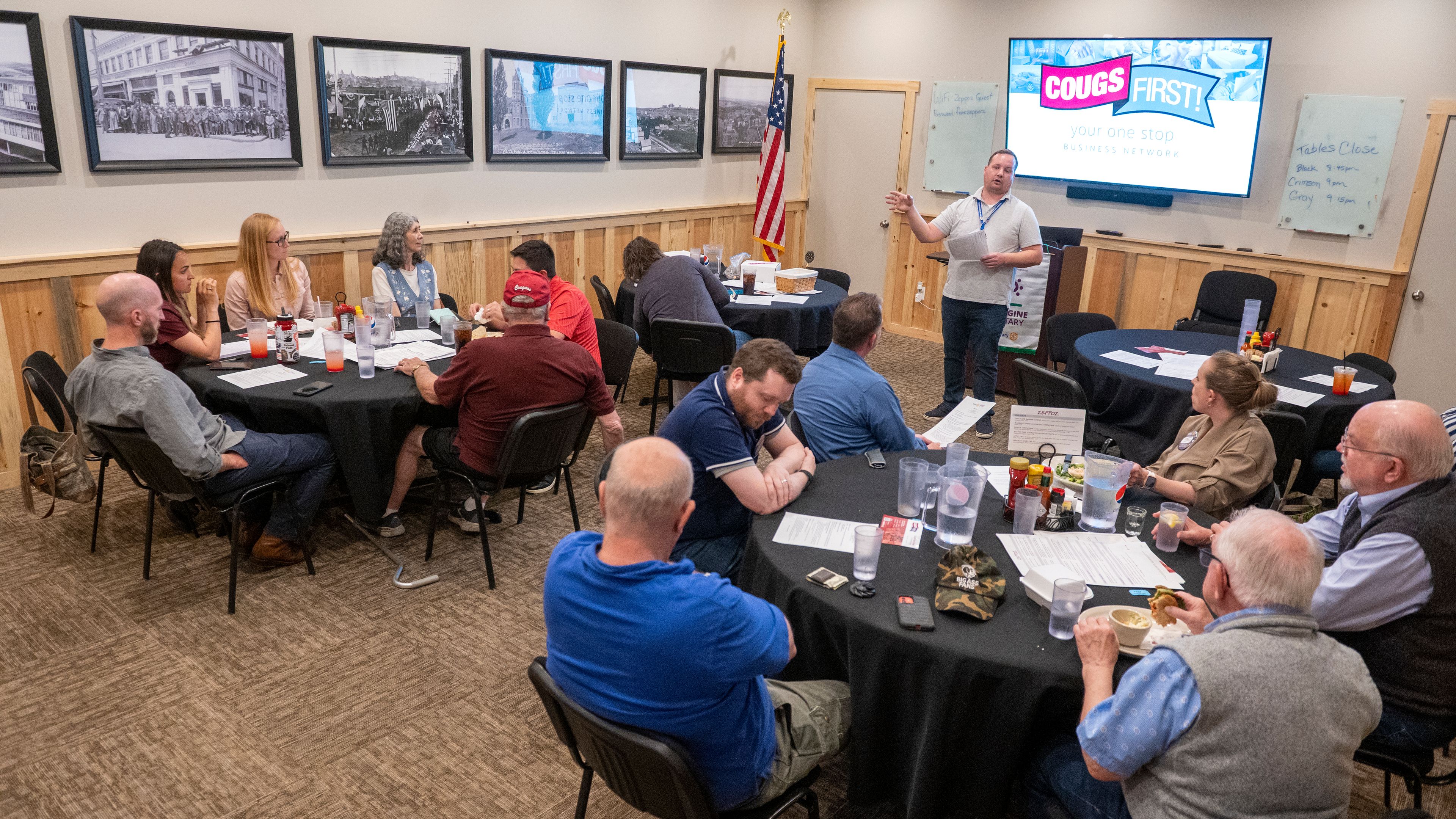 President-elect Eric Hollenbeck speaks during the Rotary Club of Pullman’s weekly meeting Wednesday at Zeppoz.