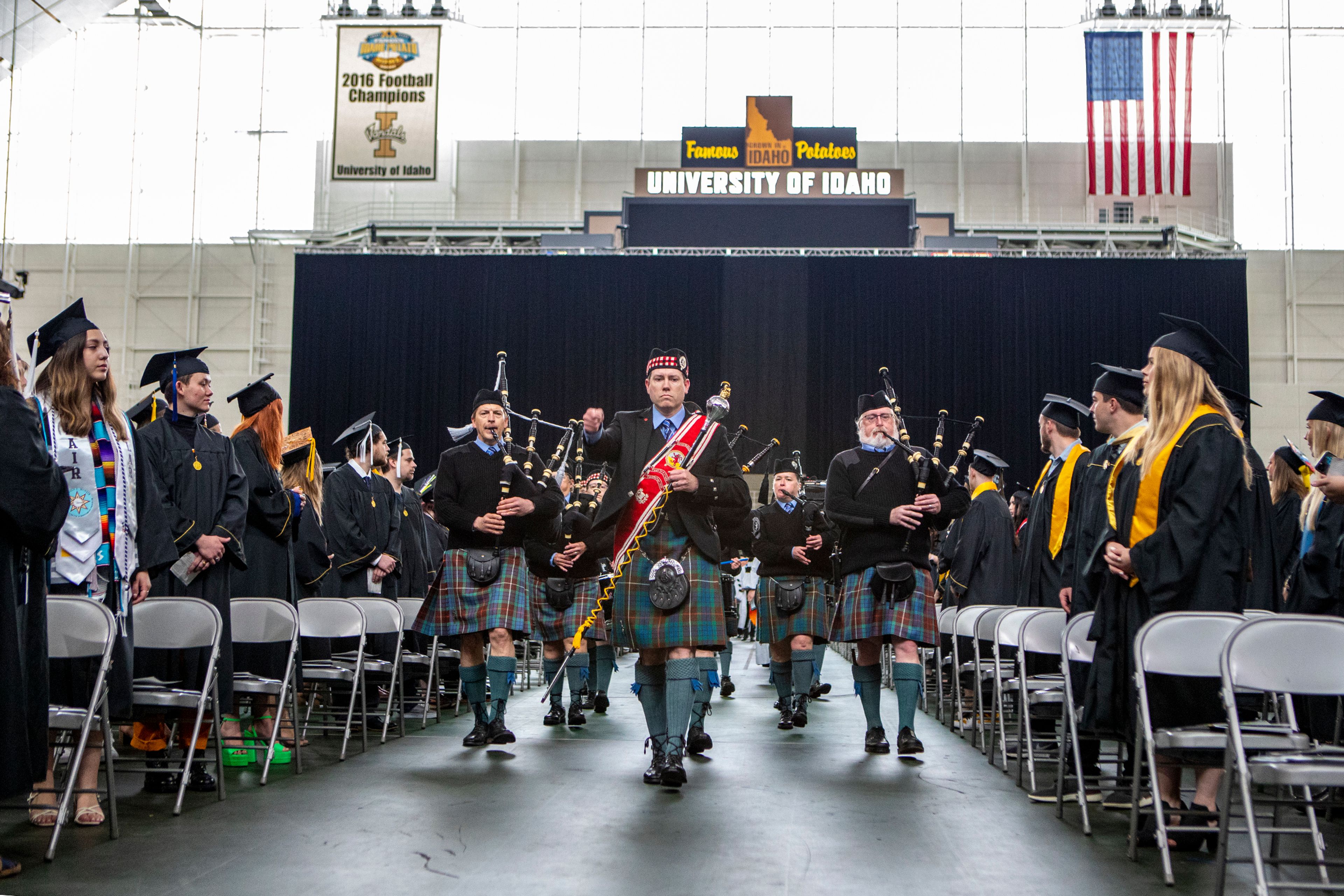 A group playing tradition Scottish music makes their way down the center aisle Saturday morning during the University of Idaho’s 2022 Spring Commencement Ceremony at the Kibbie Dome in Moscow.