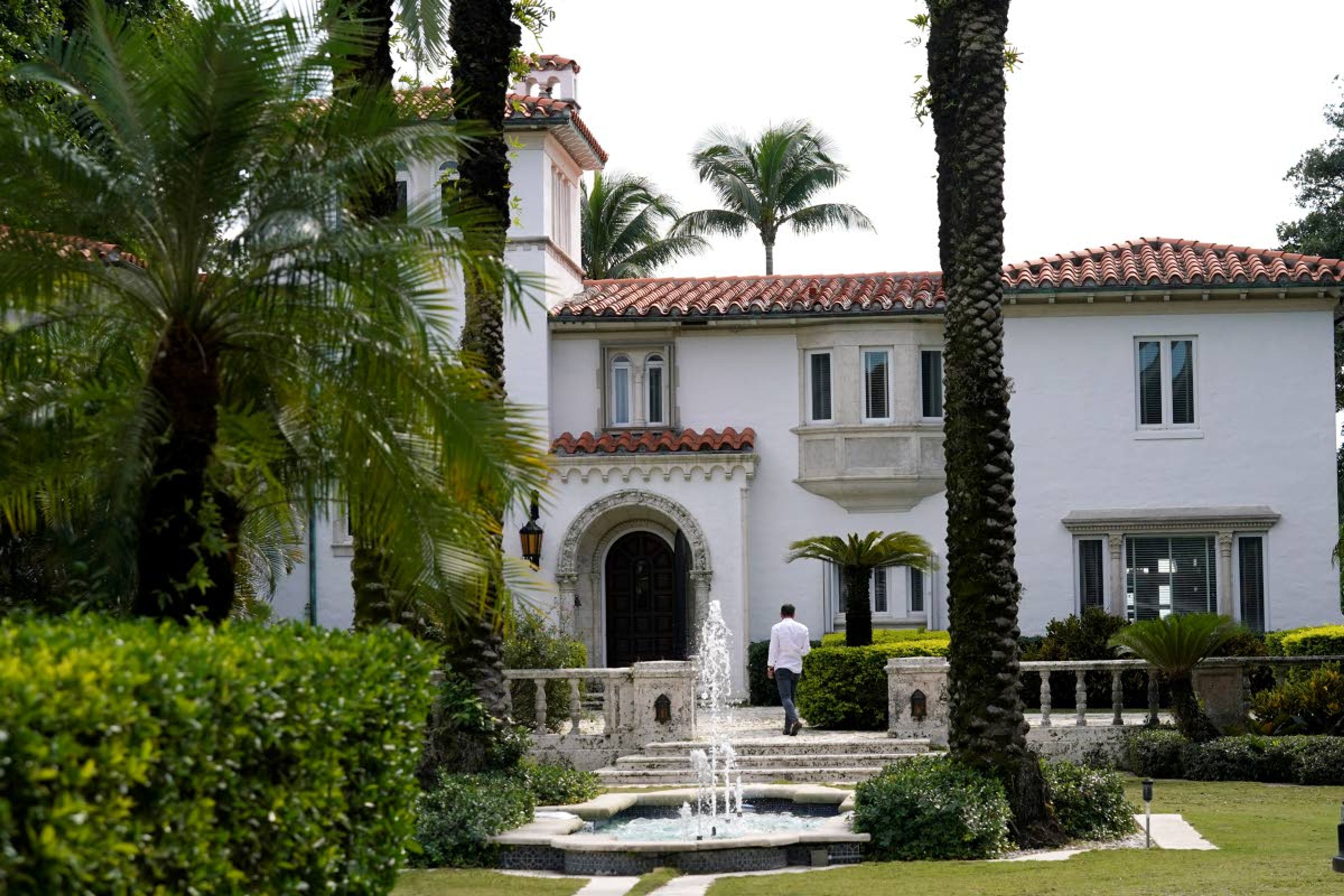 A house formally owned by pop star Madonna is pictured Monday, Nov. 15, 2021, in Miami. German Shepherd Gunther VI inherited his vast fortune, including the 9-bedroom waterfront home once owned by the Material Girl from his grandfather Gunther IV. The estate, purchased 20 years ago from the pop star, was listed for sale Wednesday. (AP Photo/Lynne Sladky)