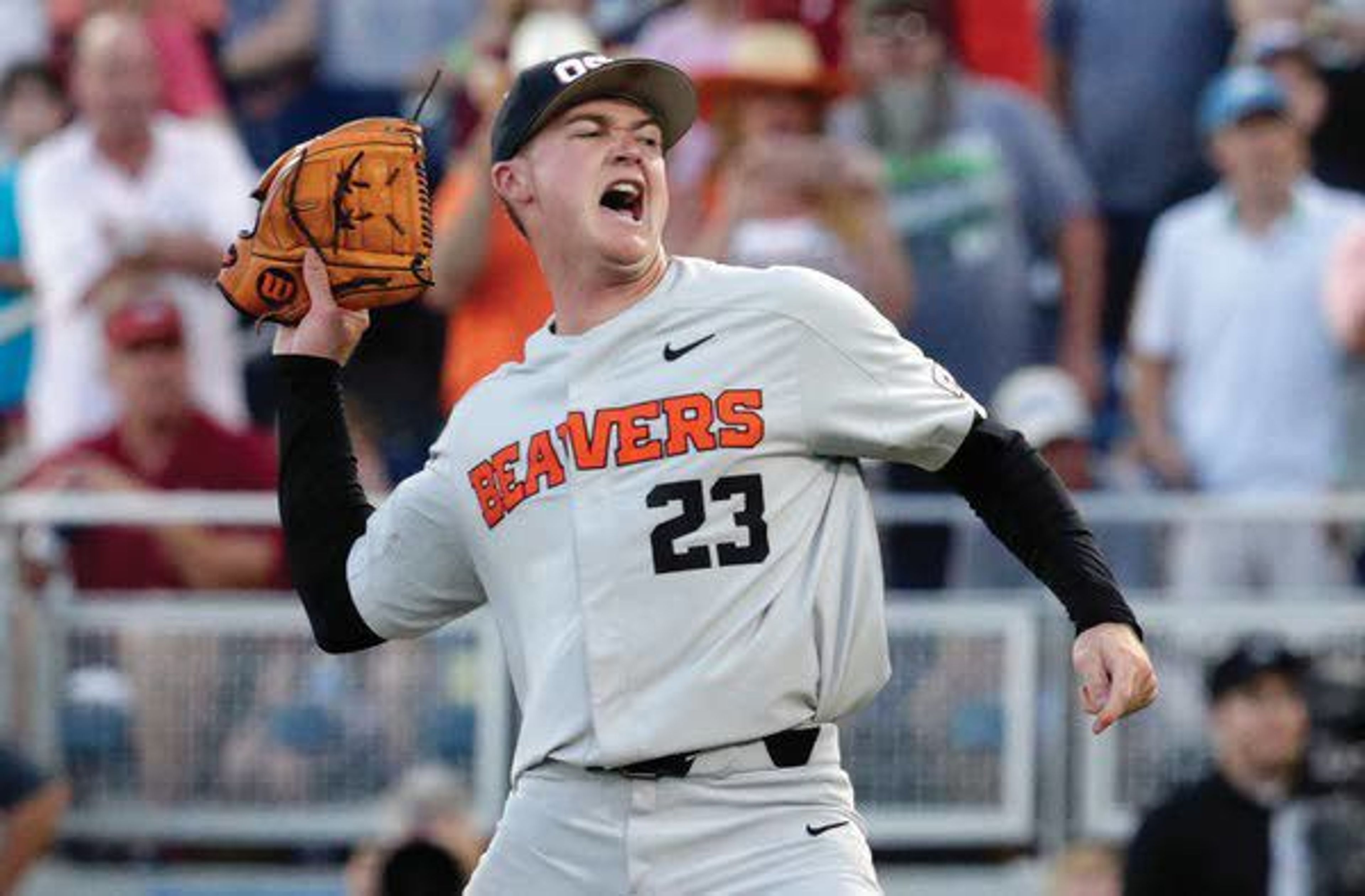 Oregon State’s Kevin Abel reacts to winning Game 3 of the NCAA College World Series finals Thursday in Omaha, Neb.