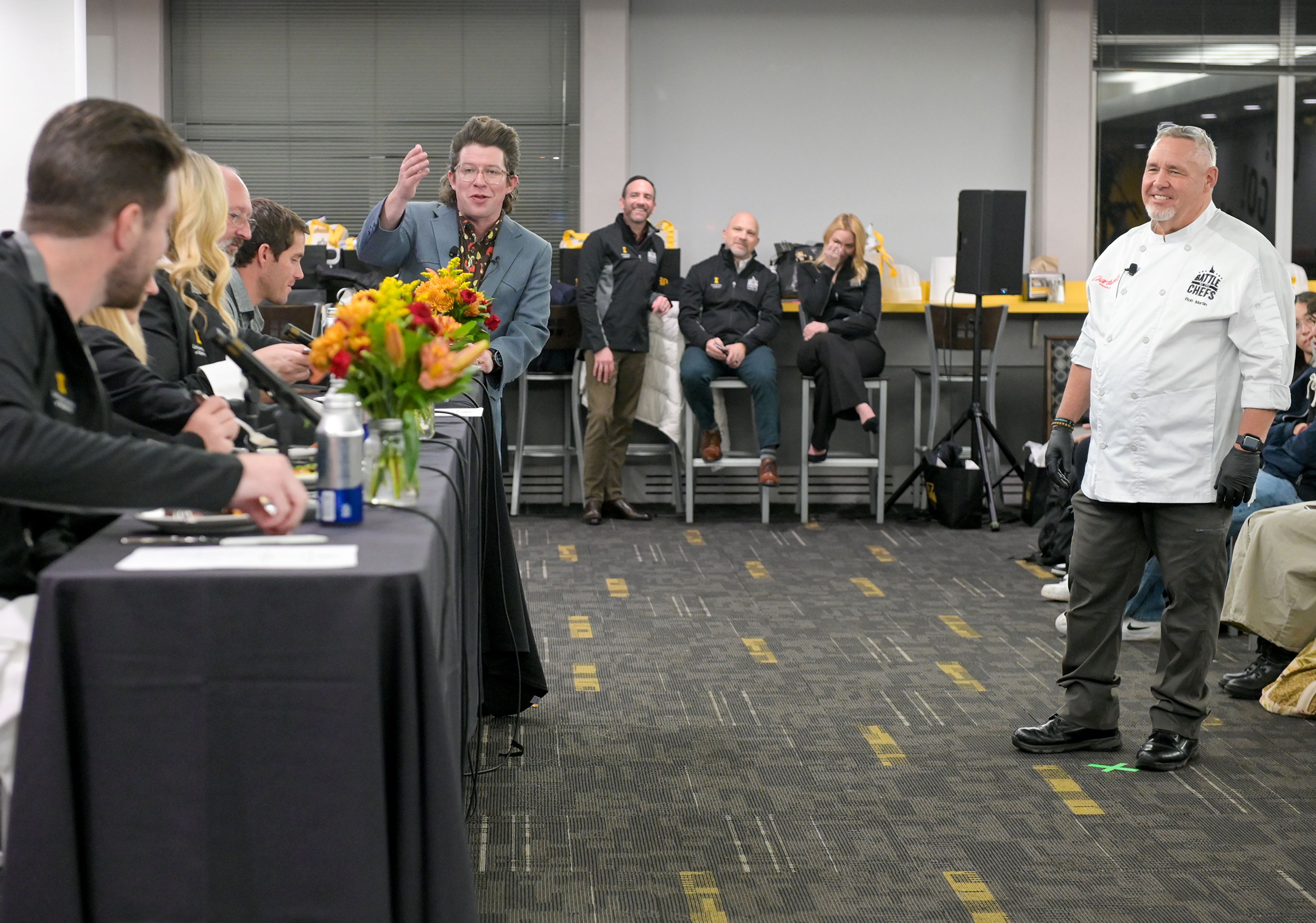 Celebrity chef Justin Warner, center, opens the floor for judges to give feedback on a dish from Chef Rob Martin, right, an executive chef with Idaho State University’s Bengal Dining, during the Battle of the Chefs competition Wednesday at The Eatery on University of Idaho campus in Moscow.