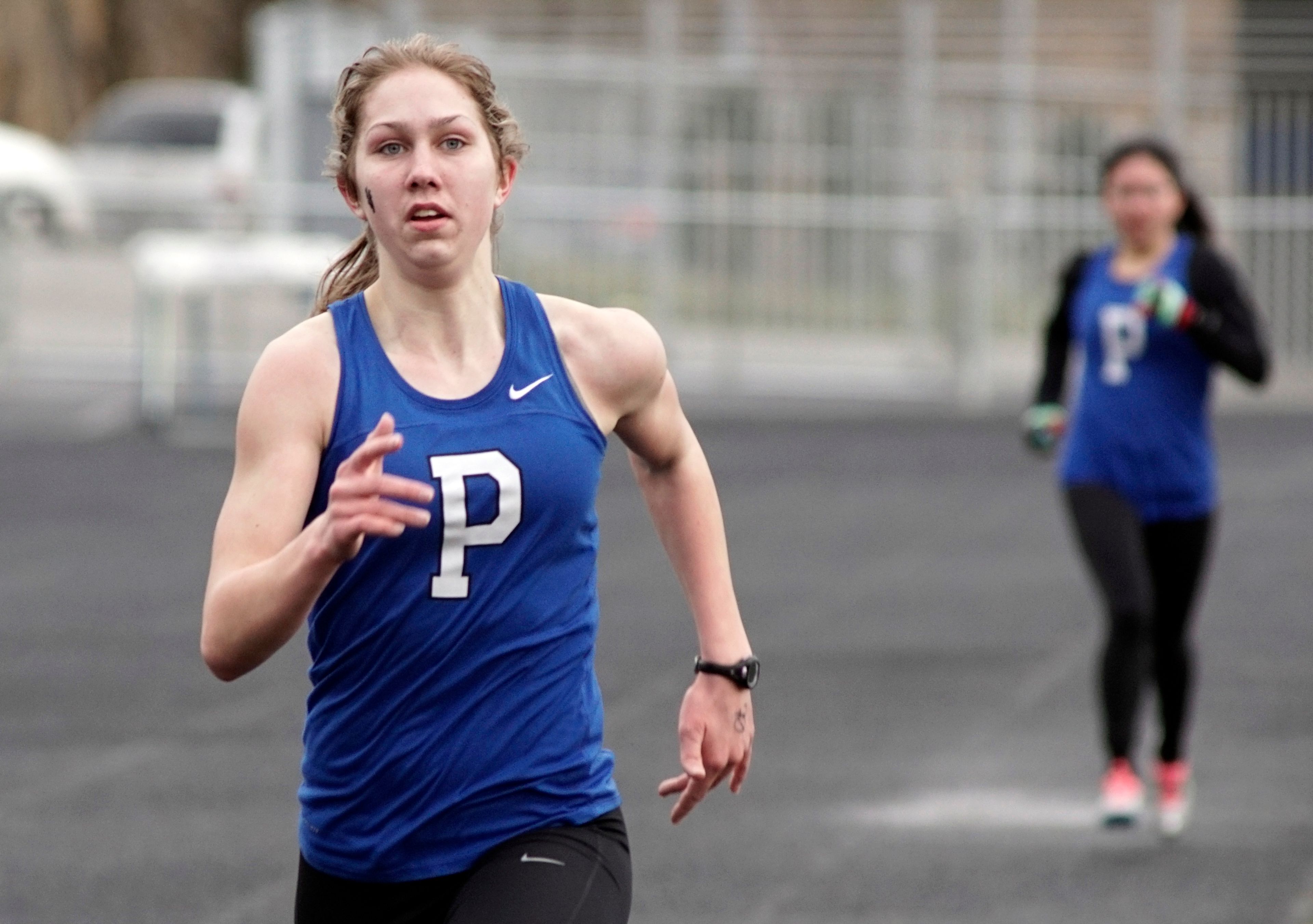 Pullman's Jenna Herzog cruises to a win in the 1600 during a dual meet with Clarkston on Wednesday in Pullman.