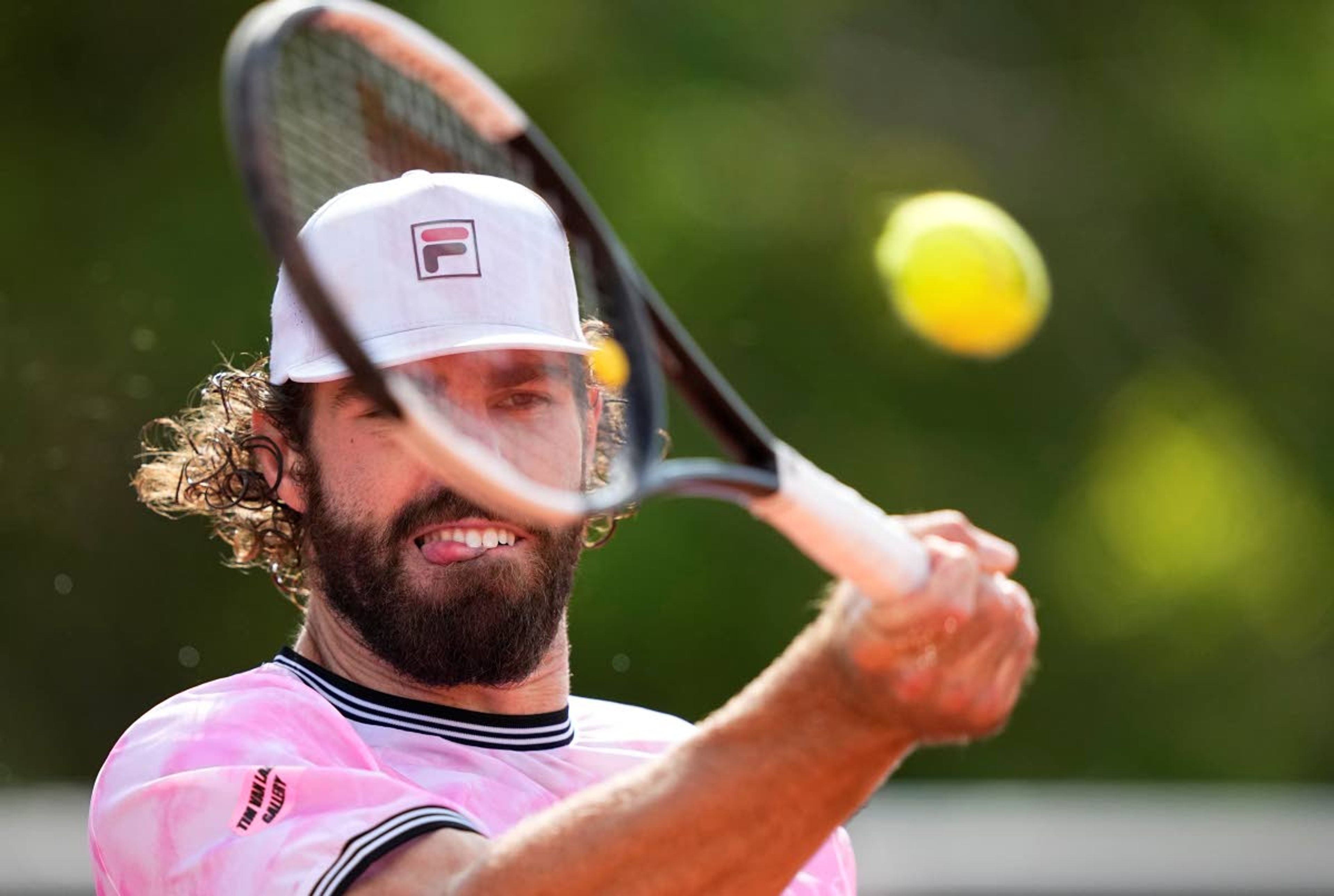 United States's Reilly Opelka plats return to Spains Jaume Lunar during their second round match on day four of the French Open tennis tournament at Roland Garros in Paris, France, Wednesday, June 2, 2021. (AP Photo/Michel Euler)