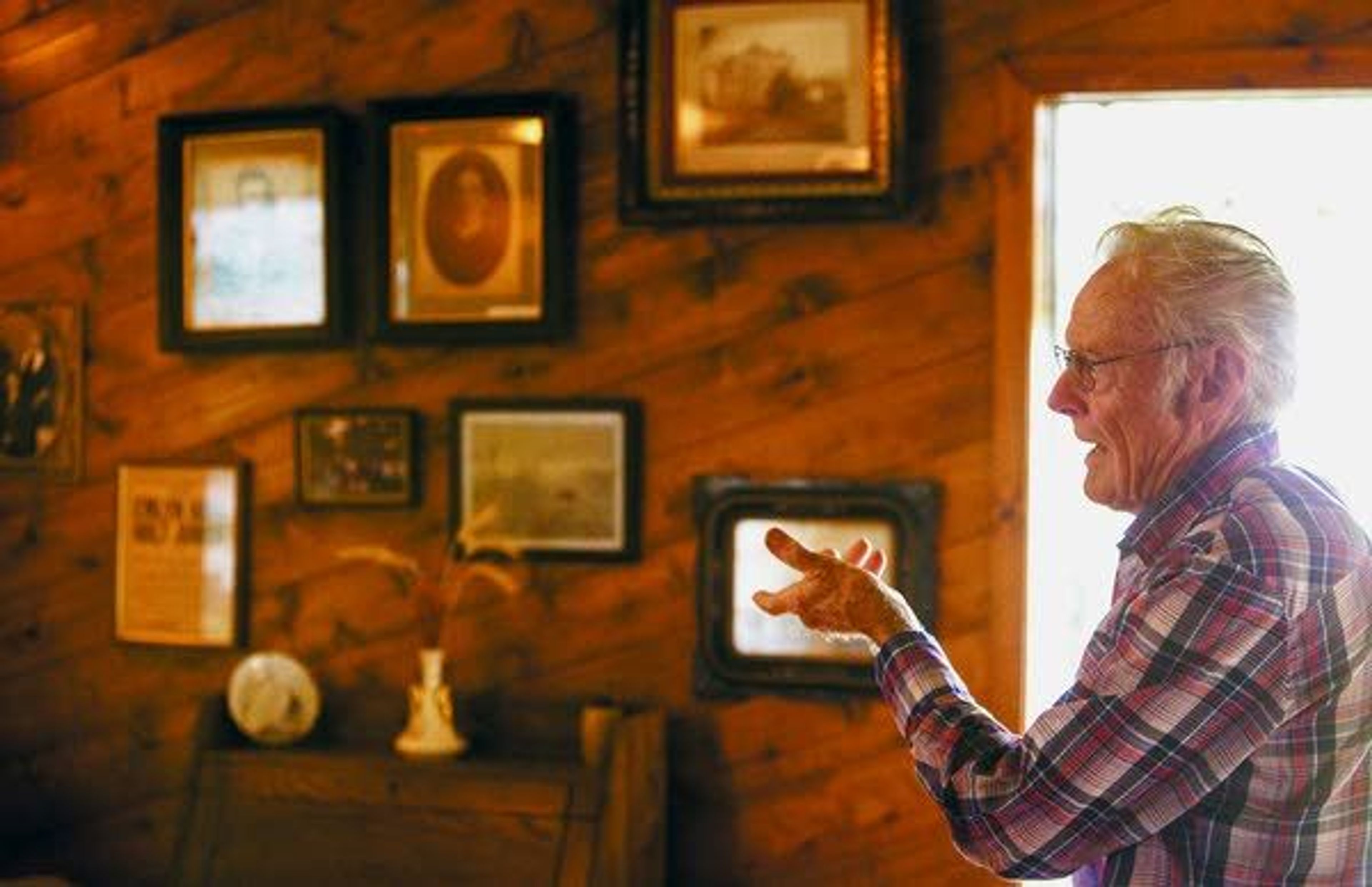 Ralph Emmett Jennings talks about the photos of his family and their land Sept. 23 at the family farm south of Pullman.