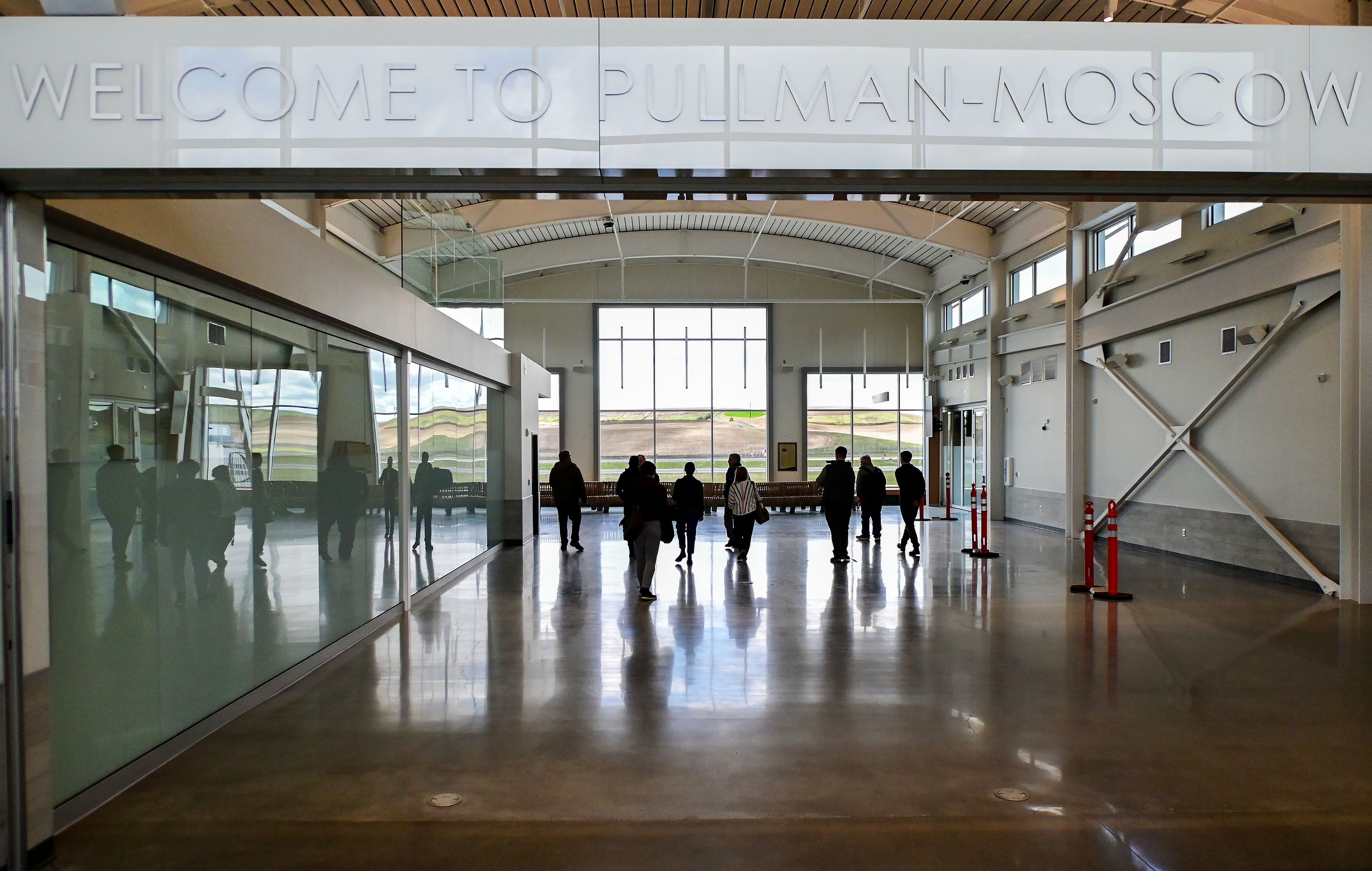 A media tour of the new terminal for the Pullman-Moscow Regional Airport at Schweitzer Field takes place in Pullman on Tuesday. The open space at the center of the terminal will be used for TSA screening when it opens for public use on May 22.