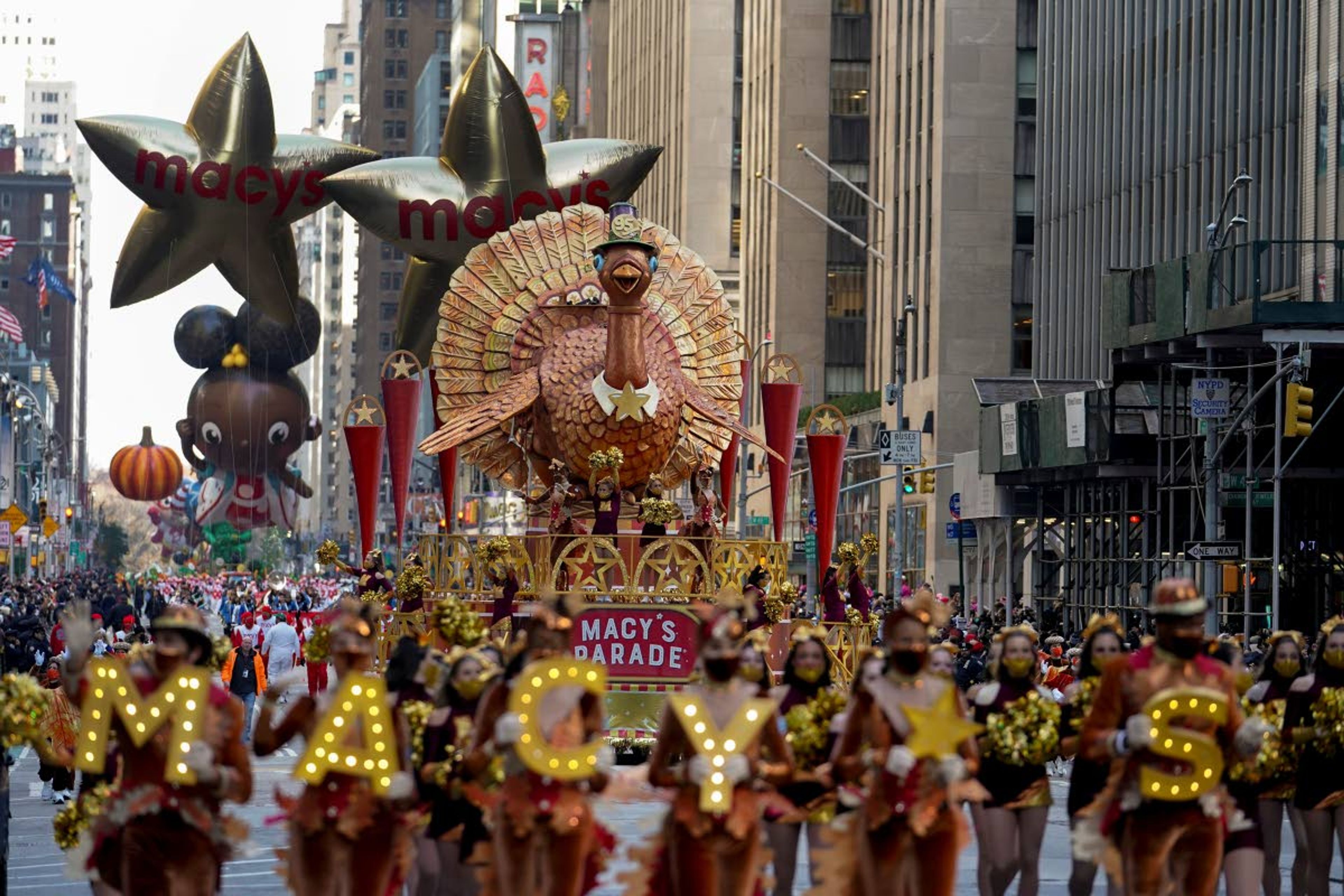 Associated PressThe Tom Turkey float moves down Sixth Avenue during the Macy’s Thanksgiving Day Parade on Thursday in New York. The parade returned in full, after being crimped by the coronavirus pandemic last year.