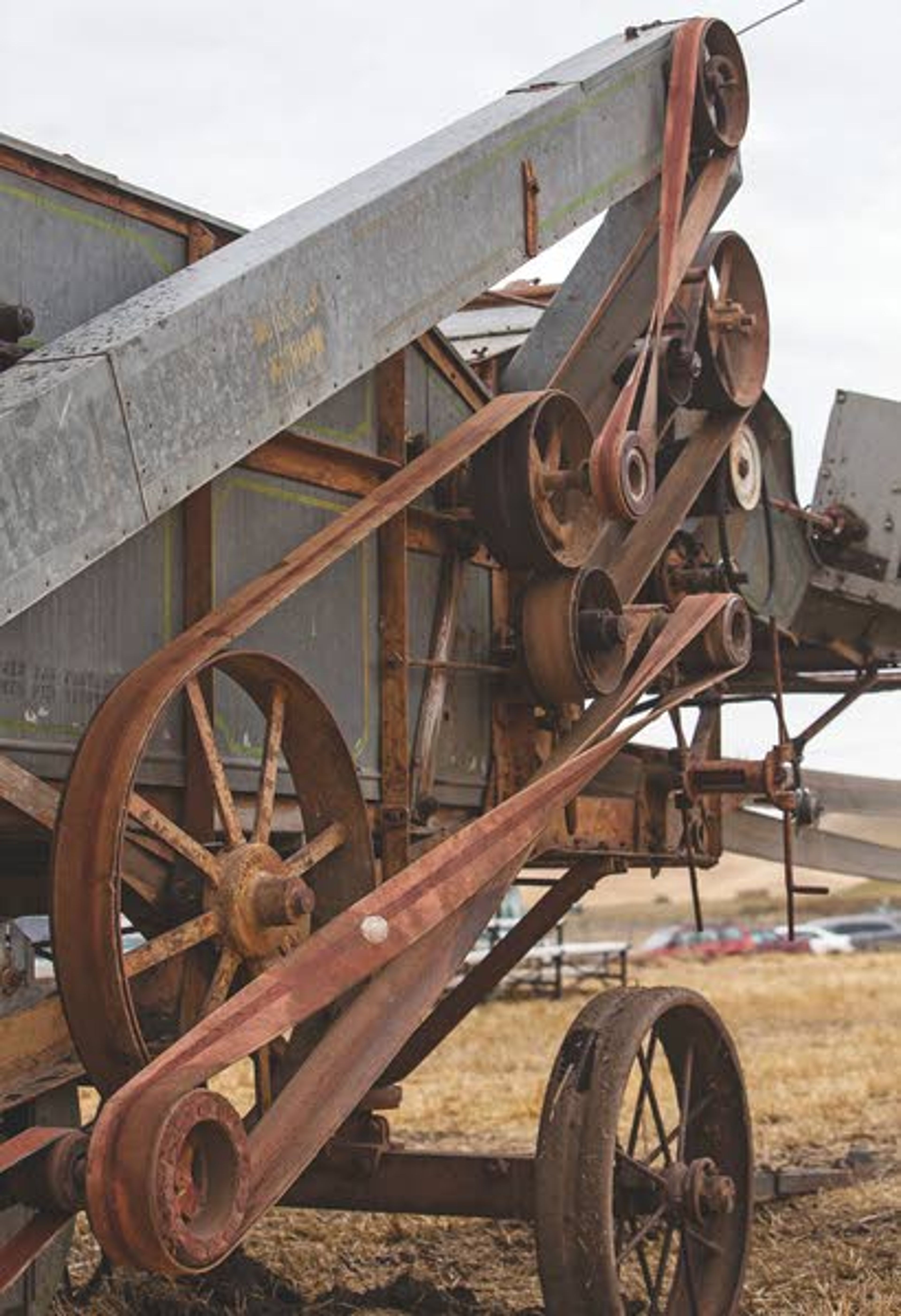 This detail shot show the belt pulley system that drives the internal parts of the threshing machine that was supposed to be used during the rained-out annual Palouse Empire Threshing Bee on Monday, Sept. 2, 2013, outside the Palouse Empire Fairgrounds in Colfax.