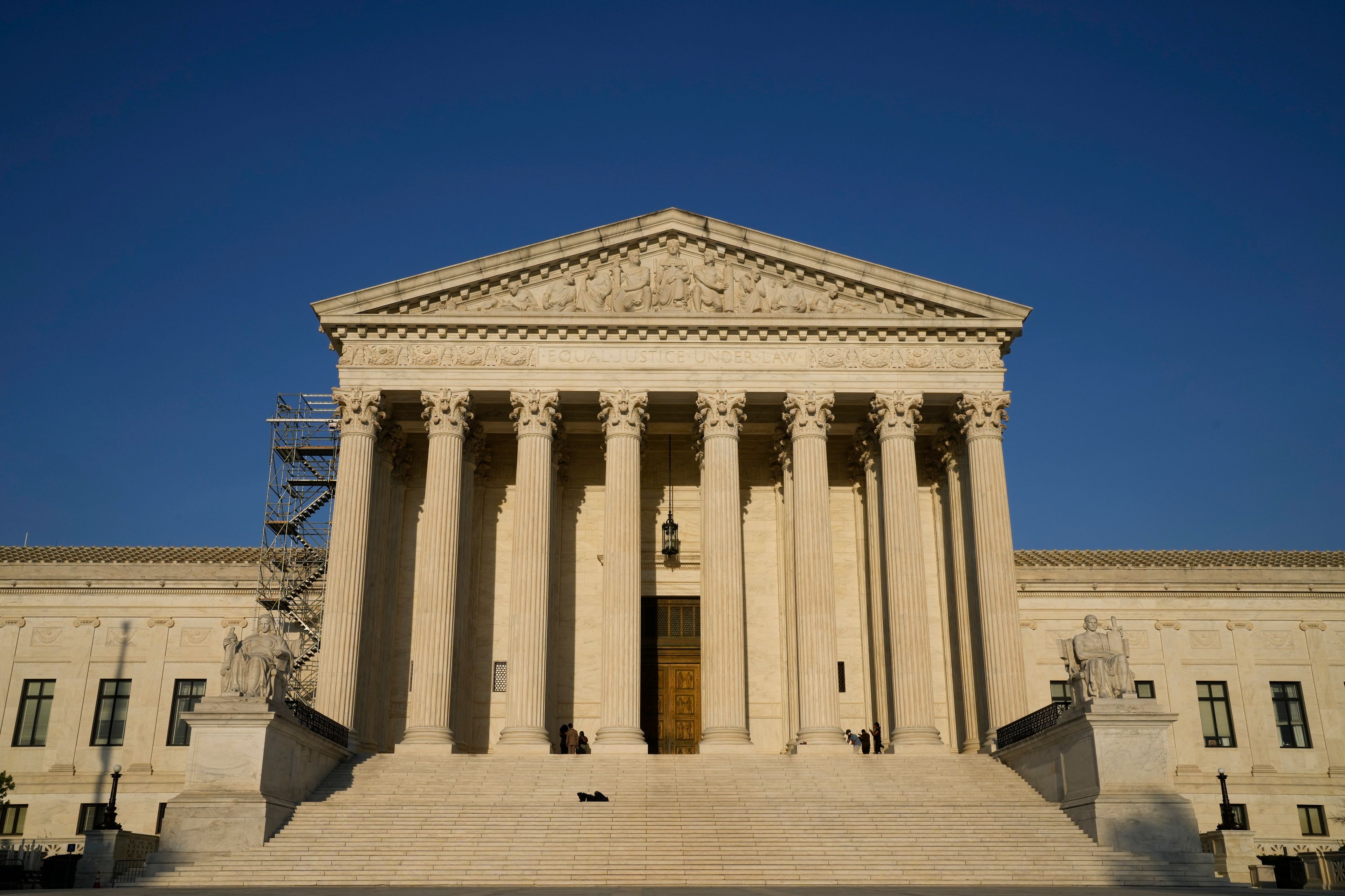 The Supreme Court is seen on Friday, April 21, 2023, in Washington. The Supreme Court has preserved women's access to a drug used in the most common method of abortion, rejecting lower-court restrictions while a lawsuit continues. The justices on Friday granted emergency requests from the Biden administration and New York-based Danco Laboratories, maker of the drug mifepristone. (AP Photo/Jacquelyn Martin)