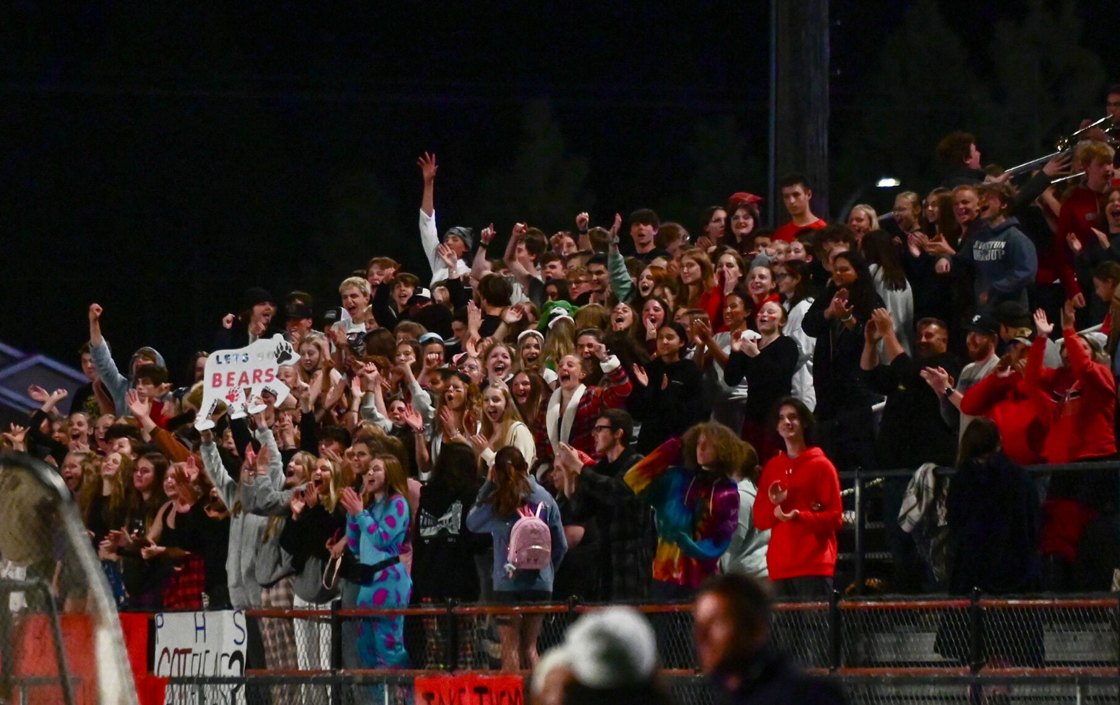 Moscow fans cheer from the stands after a touchdown against Pullman Friday in Moscow.