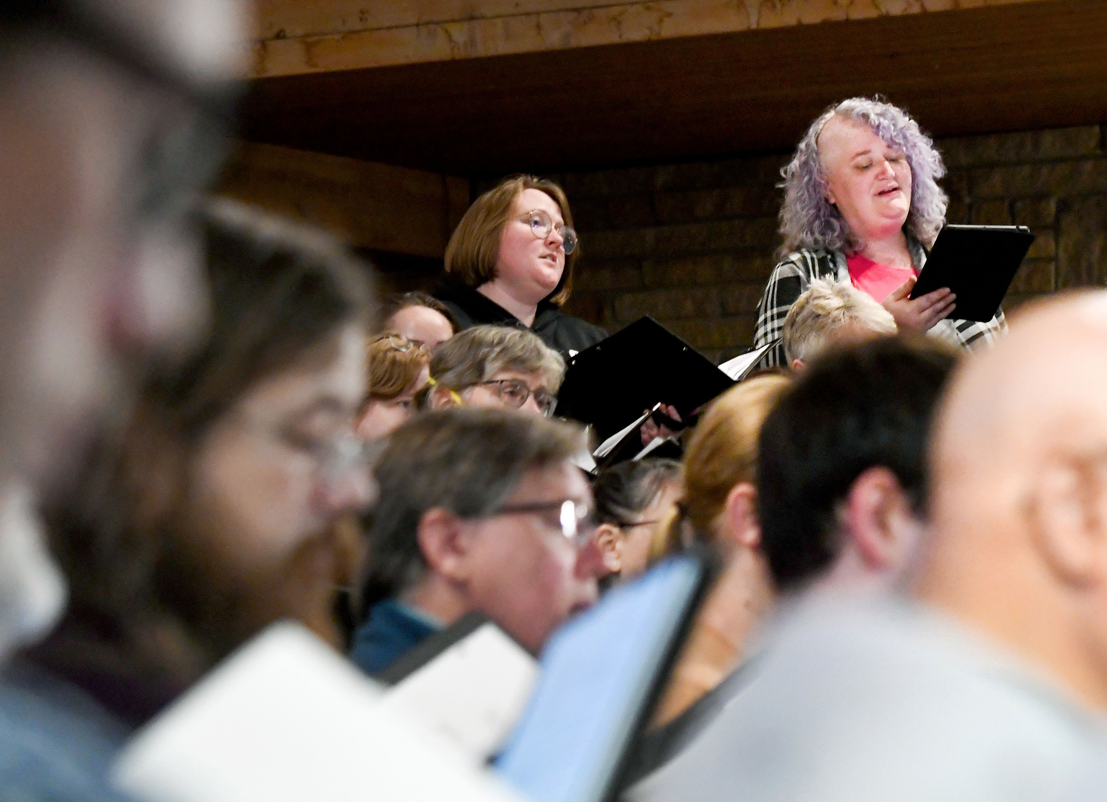 Members of the Palouse Choral Society, including president Anneliese Zook, right, rehearse Monday before the start of the group�s 25th anniversary season at Simpson United Methodist Church in Pullman.