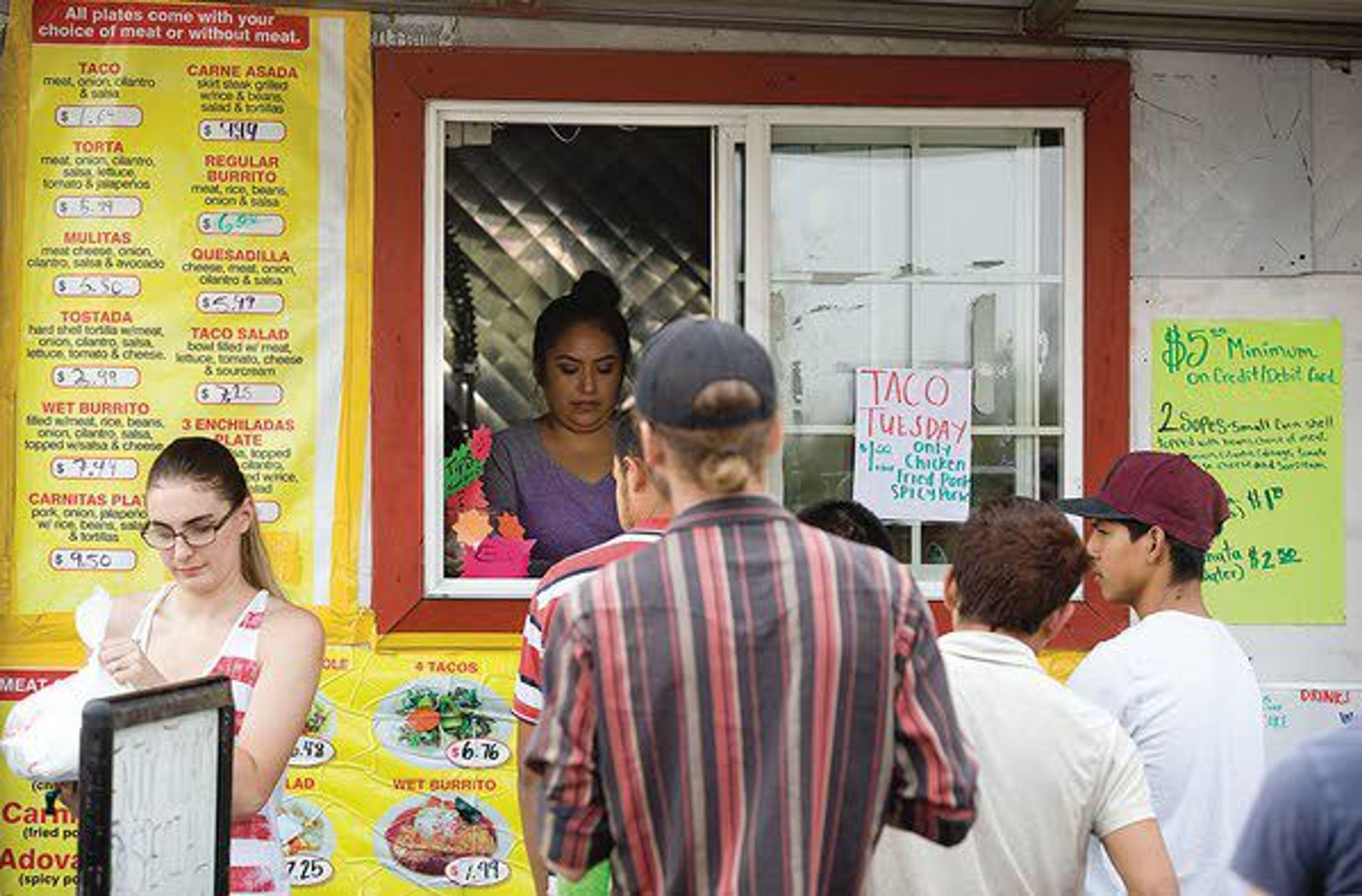 Customers line up for Taco Tuesday at Taqueria Las Torres in Moscow.