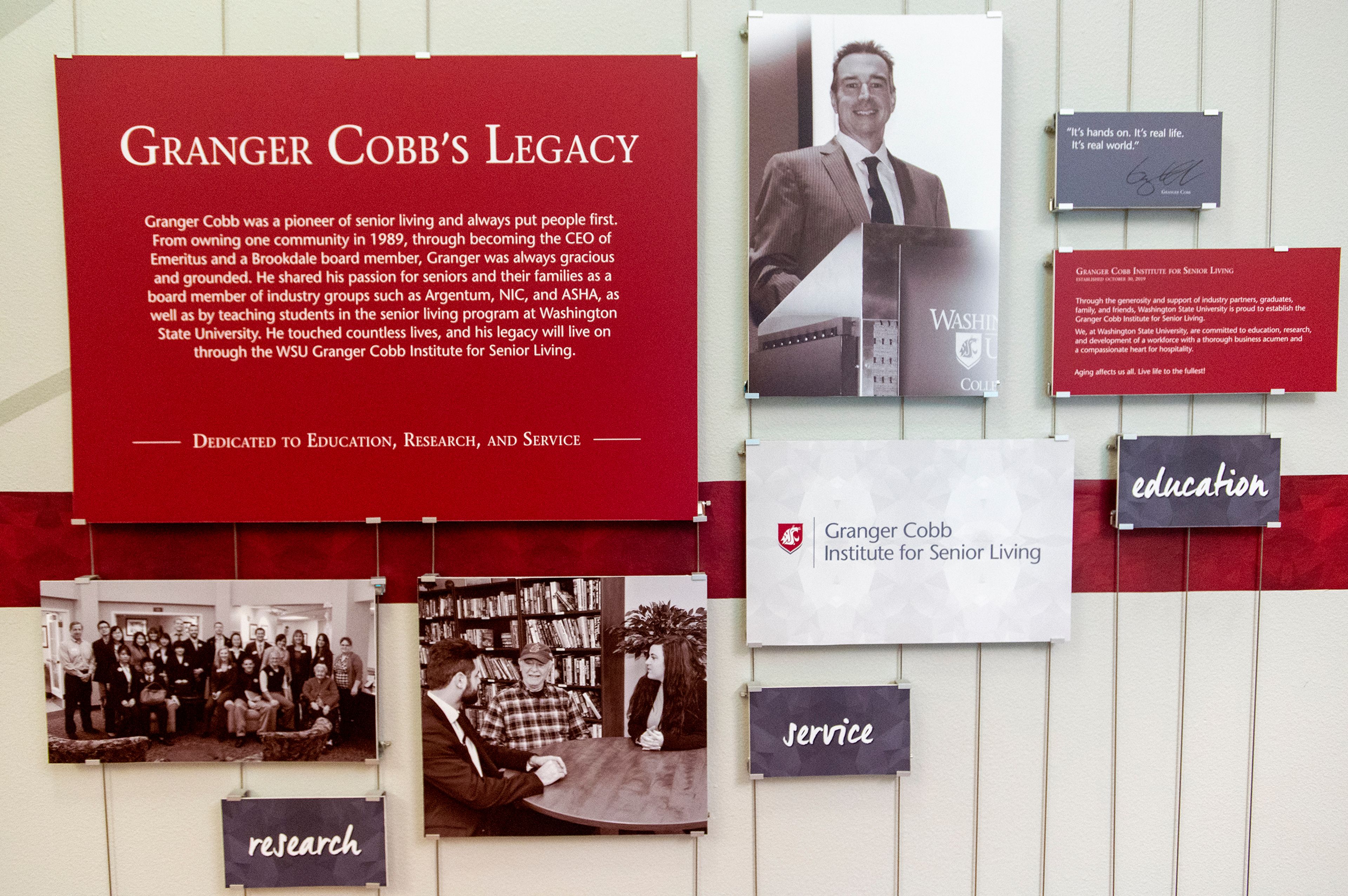 A wall dedicated to Granger Cobb is photographed across the half of Dr. Swanger’s Todd Hall office in Pullman on Tuesday.