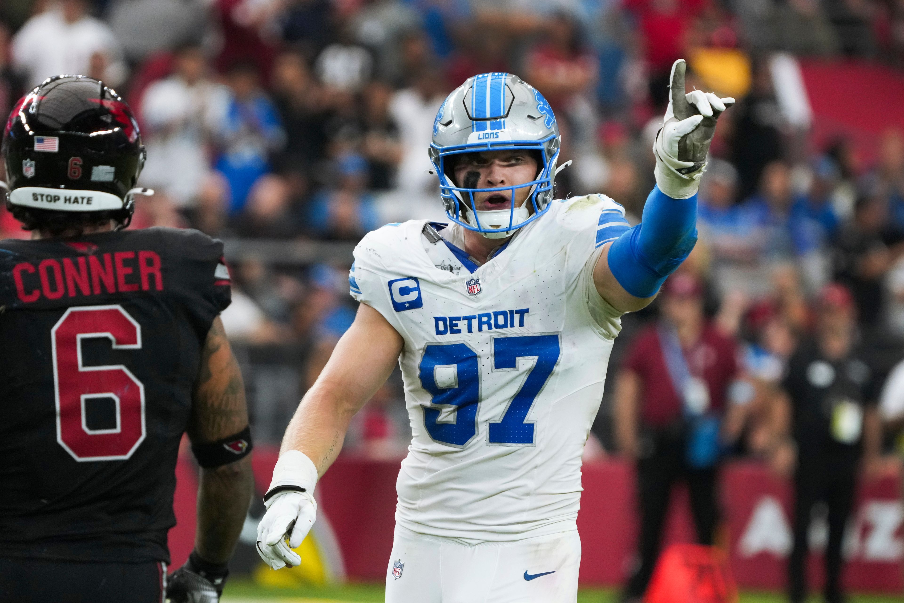 Detroit Lions defensive end Aidan Hutchinson (97) reacts to a sack against Arizona Cardinals quarterback Kyler Murray during the second half of an NFL football game Sunday, Sept. 22, 2024, in Glendale, Ariz. (AP Photo/Rick Scuteri)