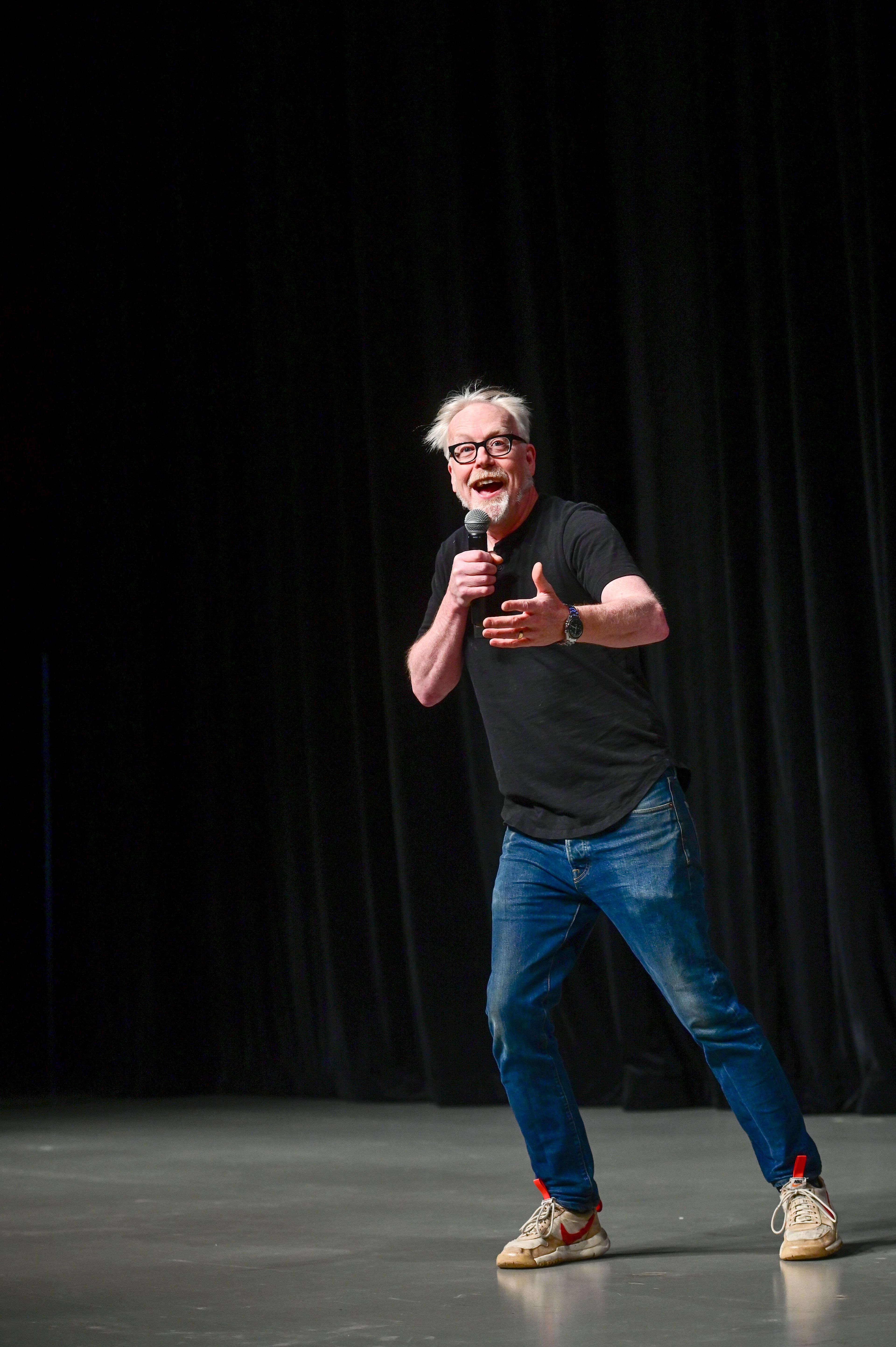 Adam Savage speaks at an Earth Day event hosted at Beasley Coliseum in Pullman on Sunday. The former co-host of "MythBusters" gave a keynote on his work and responded to crowd questions.