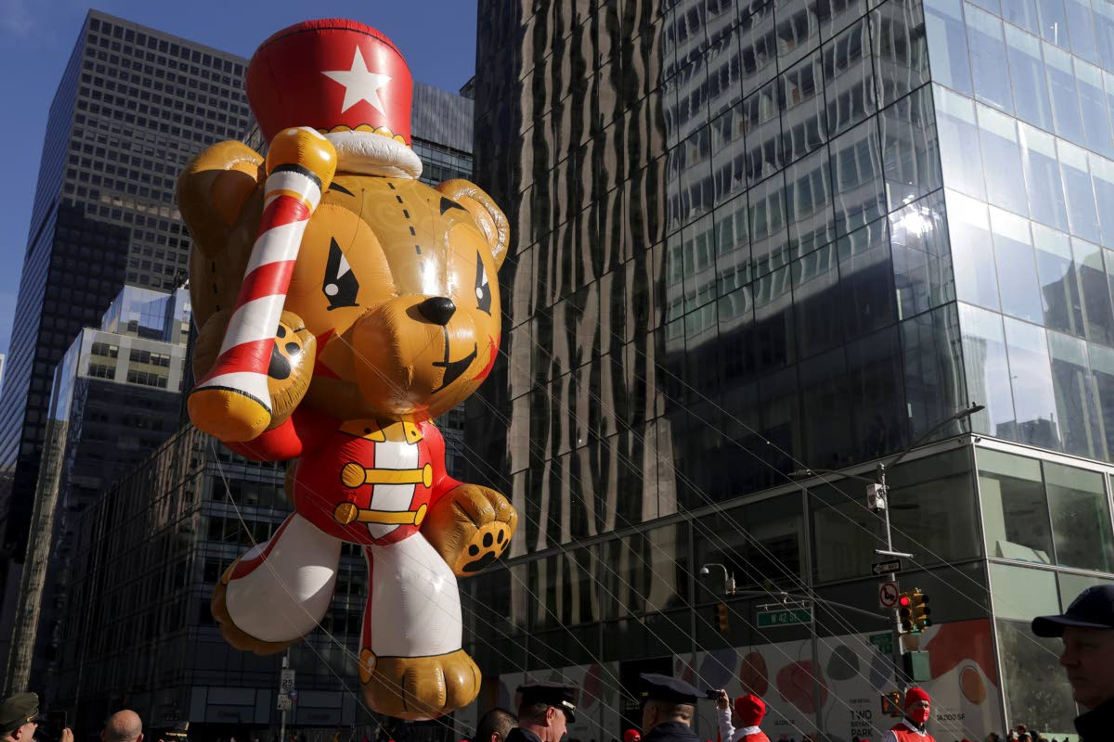 The Toni balloon makes its way down Sixth Avenue during the Macy's Thanksgiving Day Parade, Thursday, Nov. 25, 2021, in New York. The Macy's Thanksgiving Day Parade returned in full, after being crimped by the coronavirus pandemic last year. The Thanksgiving parade is the latest U.S. holiday event to make a comeback amid the ongoing pandemic. (AP Photo/Jeenah Moon)