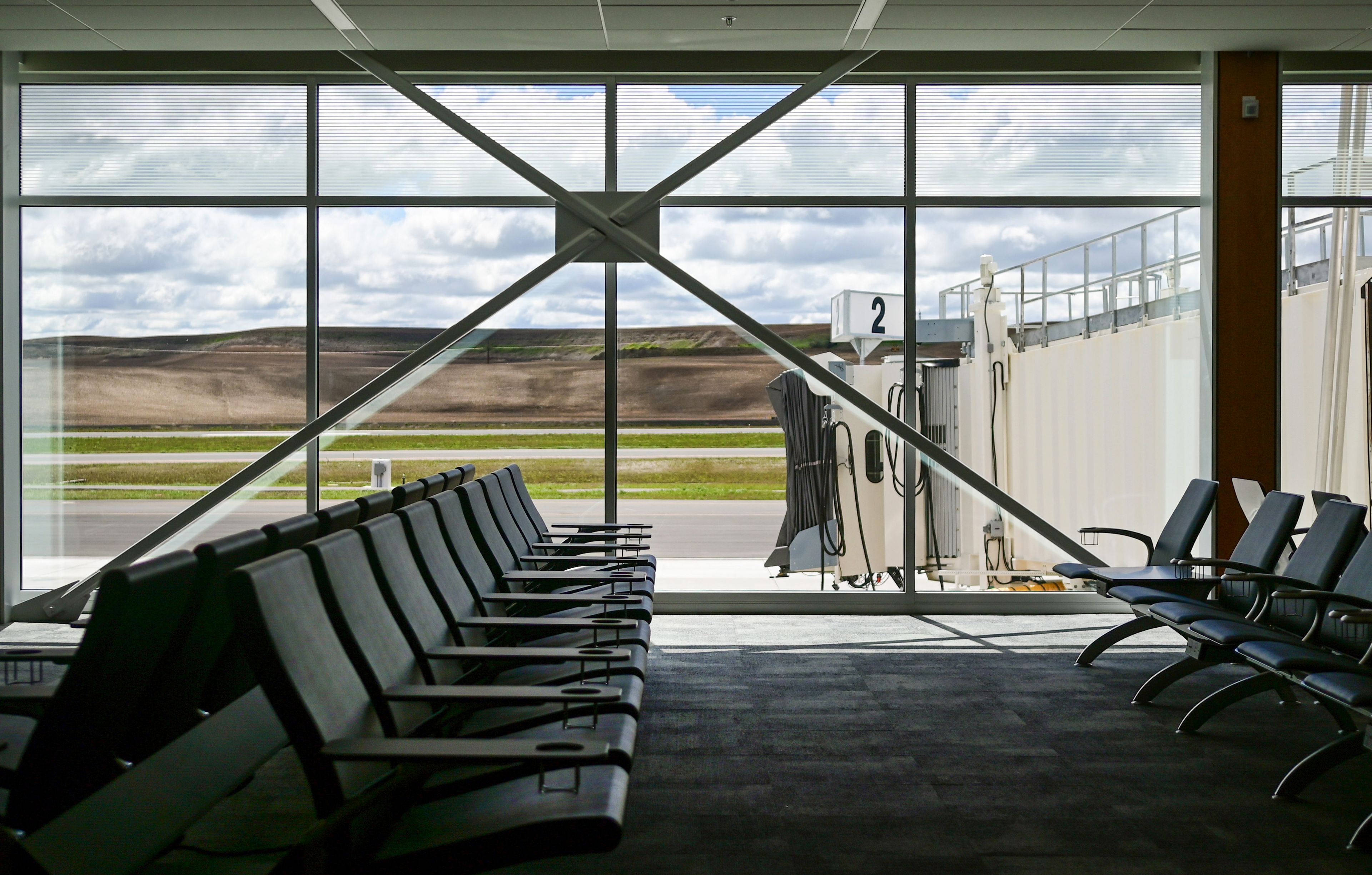 Seats fill the waiting area in front of Gate 2 at the new terminal at the Pullman-Moscow Regional Airport at Schweitzer Field in Pullman on Tuesday. Power outlets were built into the base of the seats and tables at the gates.