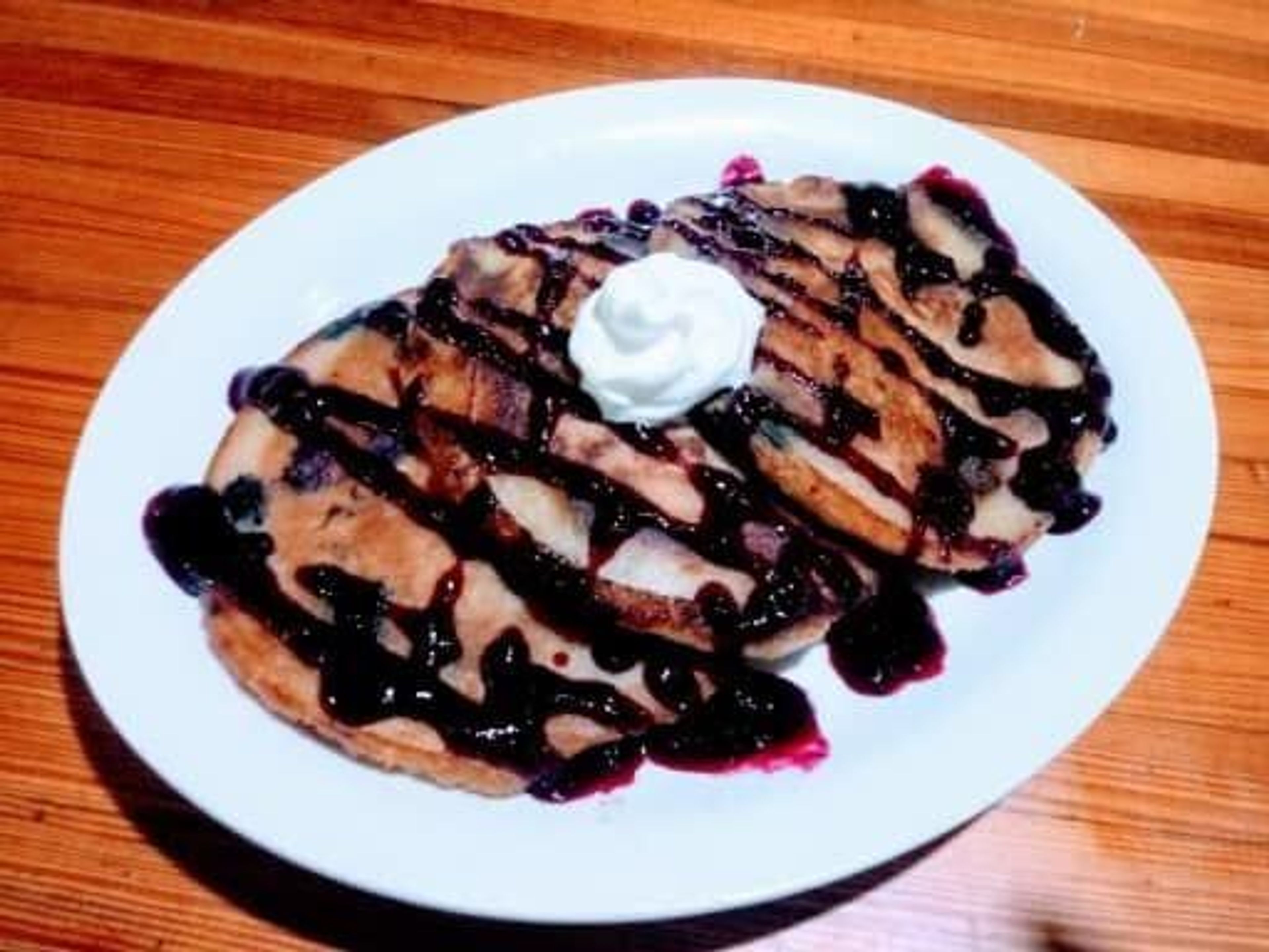 Blueberry pancakes are served at Mingles Bar & Grill.