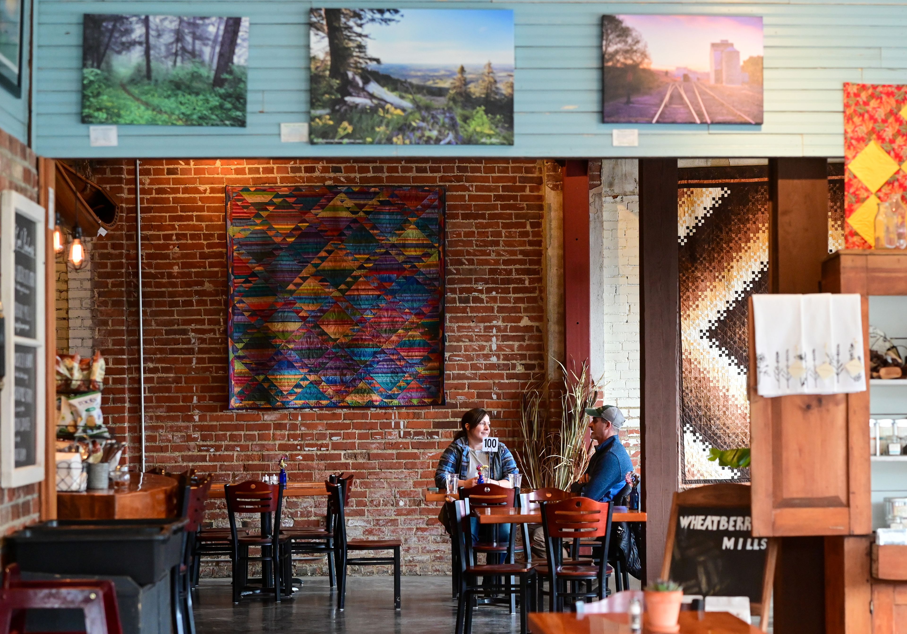 Leah Opitz, of Standpoint, and Stuart Hurley, of Boise, chat before eating lunch at The Pie Safe Bakery in Deary on Wednesday.