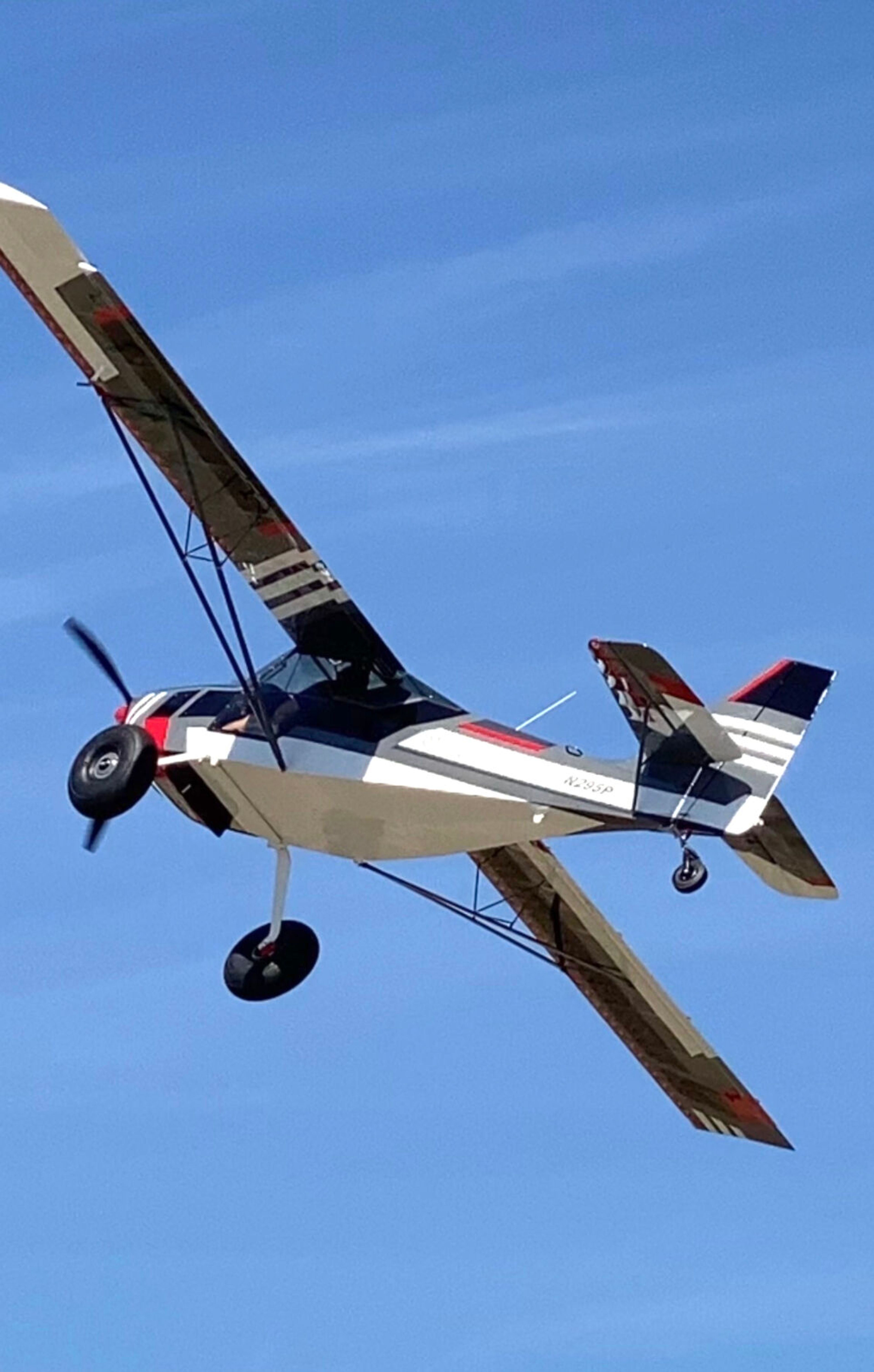 Brandon Petersen’s plane, a homebuilt Rotax 916-powered Kitfox is pictured flying in the air.