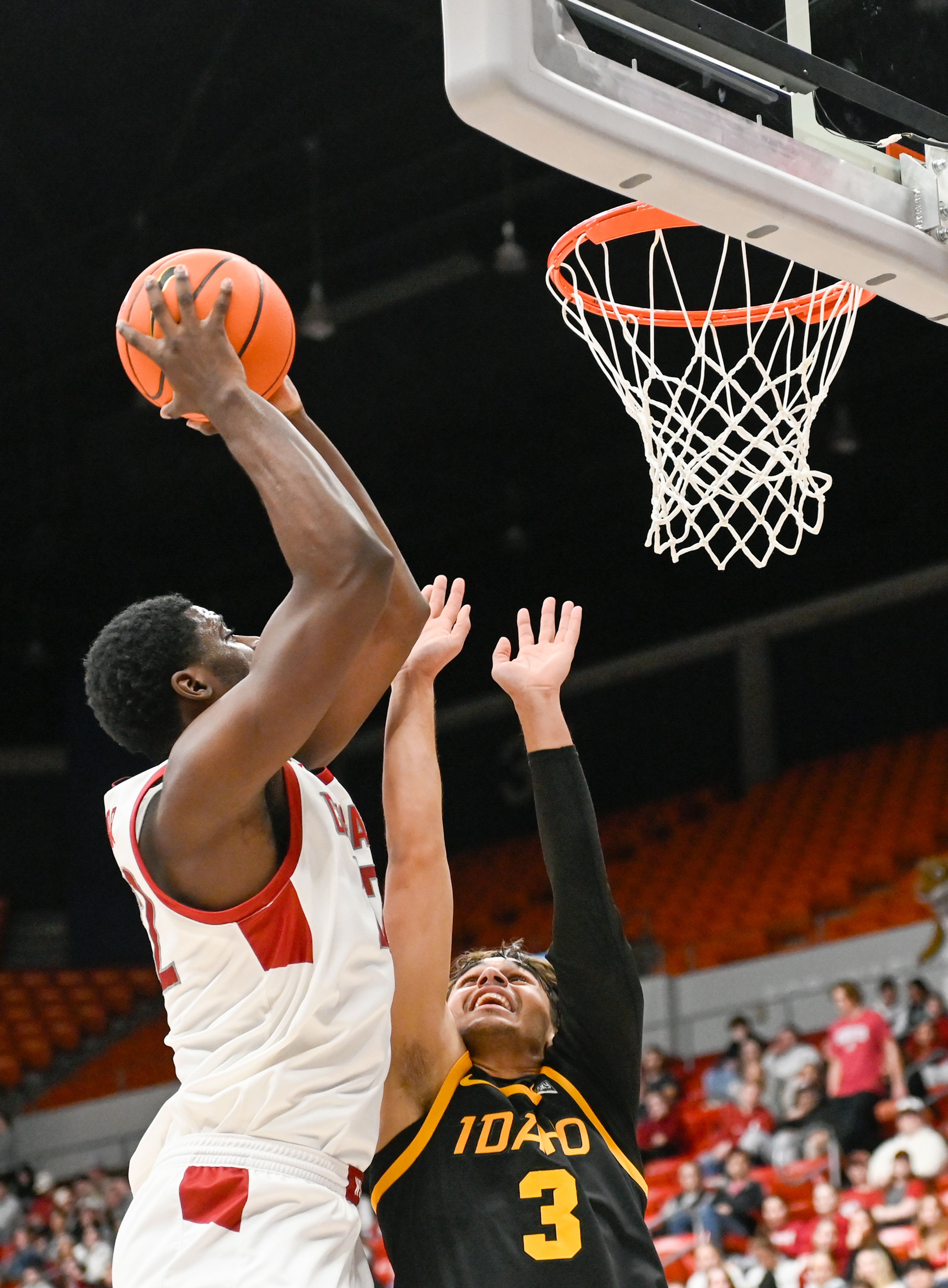 Washington State forward ND Okafor is blocked from a two-point shot by Idaho guard Jojo Anderson during the Battle of the Palouse game at Beasley Coliseum in Pullman.