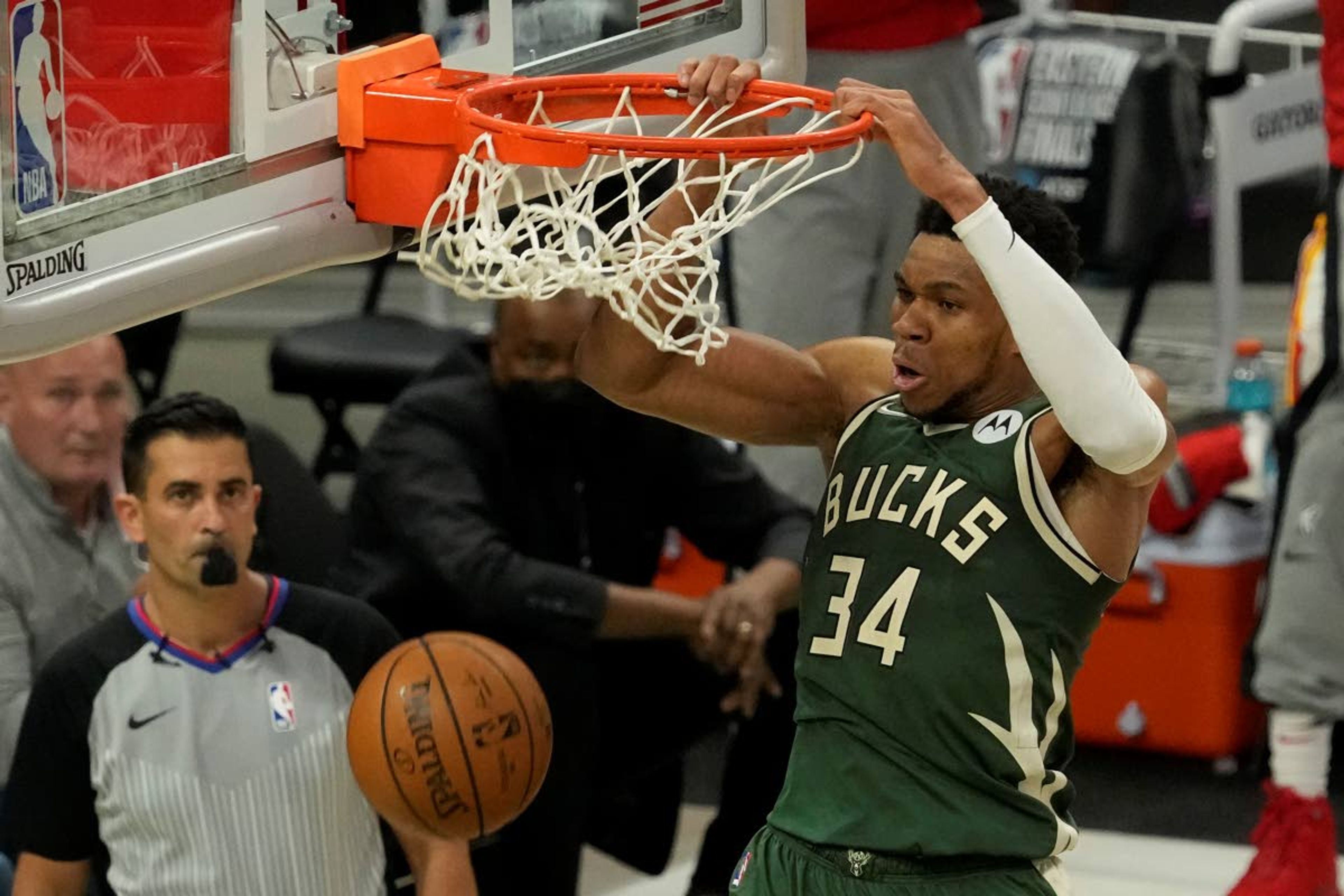 Milwaukee Bucks' Giannis Antetokounmpo dunks during the second half of Game 1 of the NBA Eastern Conference basketball finals game against the Atlanta Hawks Wednesday, June 23, 2021, in Milwaukee. (AP Photo/Morry Gash)