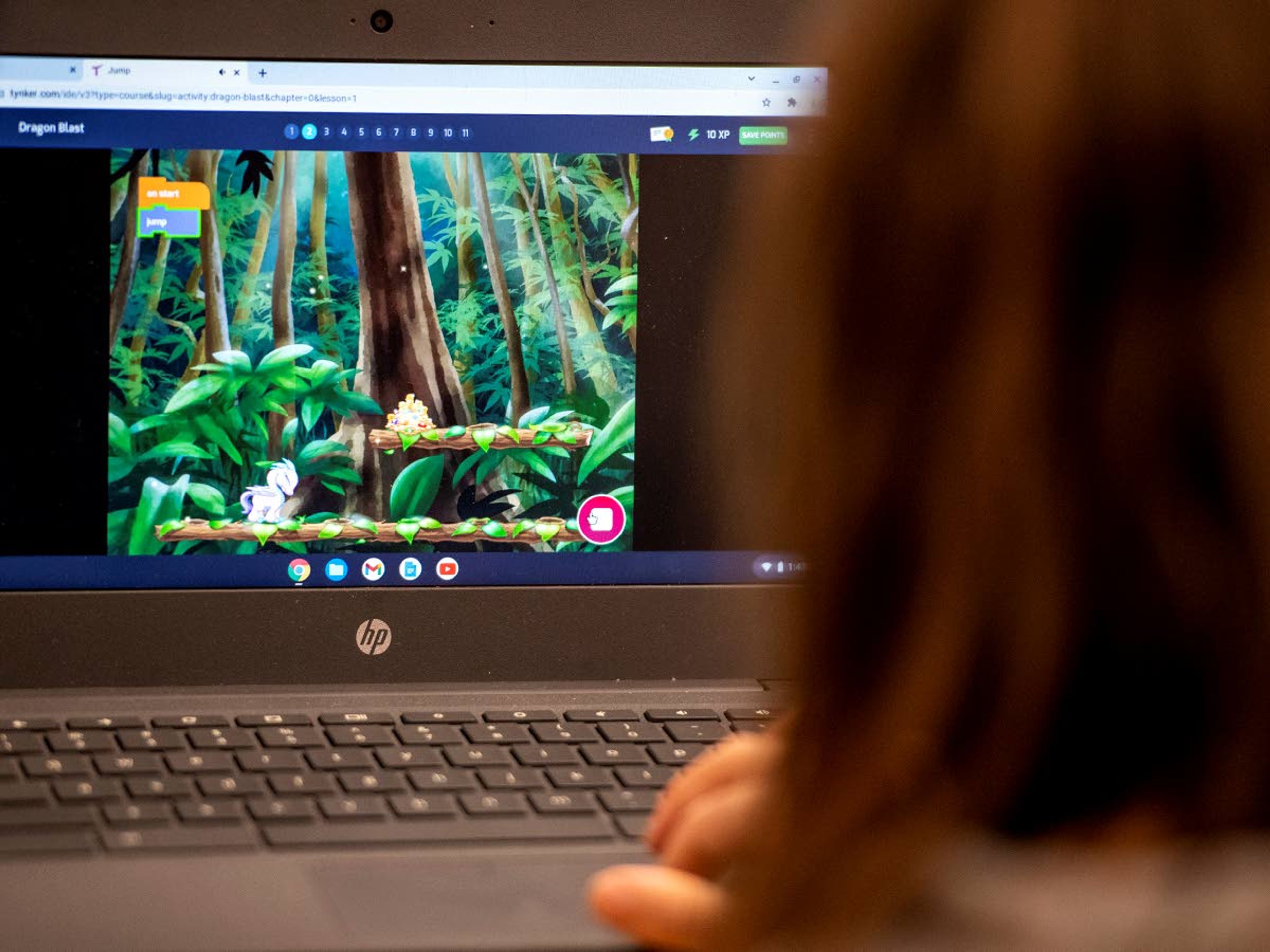 A third grade student at Potlatch Elementary practices coding by playing “Dragon Blast,” on a school laptop on Friday afternoon.