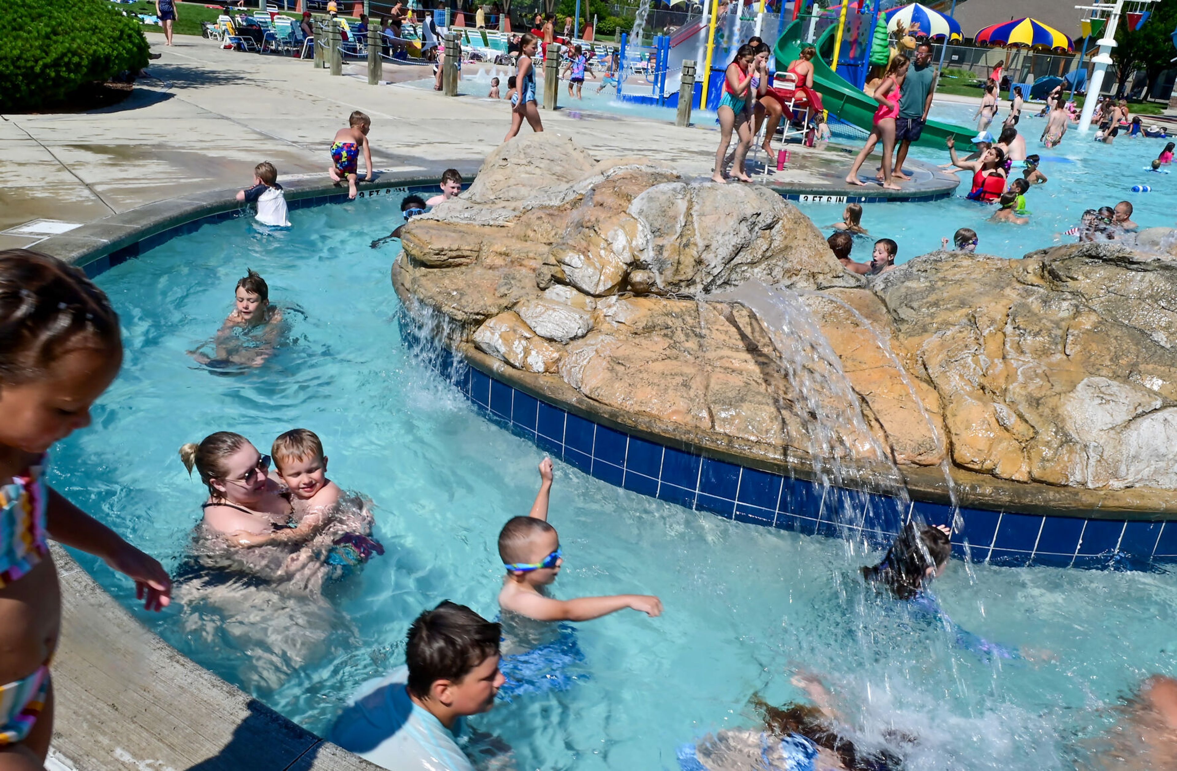 The Hamilton-Lowe Aquatics Center is filled with people as temperatures reach the 90s on Monday in Moscow.