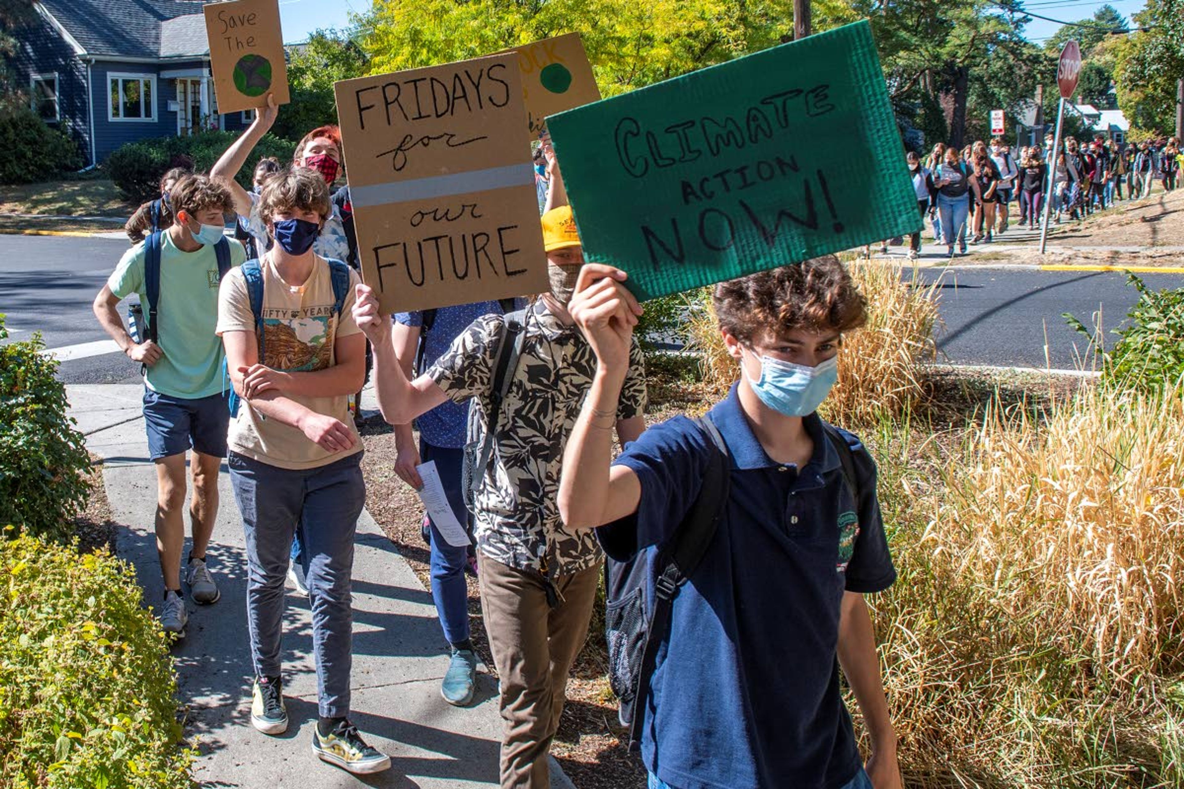 Students from Moscow High School participate in Global Walkout Day as they march to East City Park as part of the Fridays for Future strike to advocate for 100 percent renewable energy in Moscow on Friday morning.