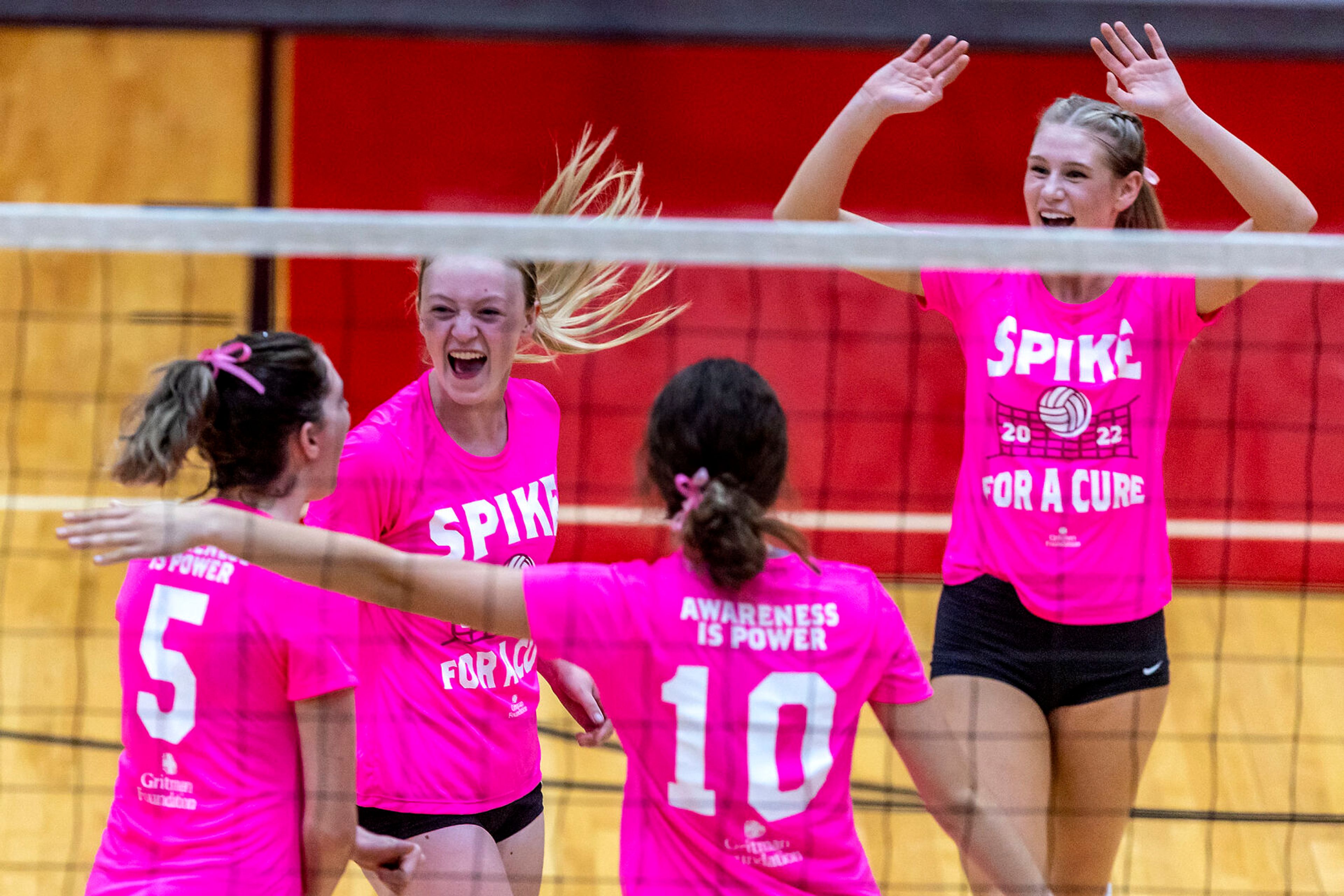 Moscow volleyball players celebrate a point during a Sept. 22 home match against Lewiston. The Bears will be competing in the Idaho Class 4A state tournament starting Friday at Thunder Ridge High School in Idaho Falls.