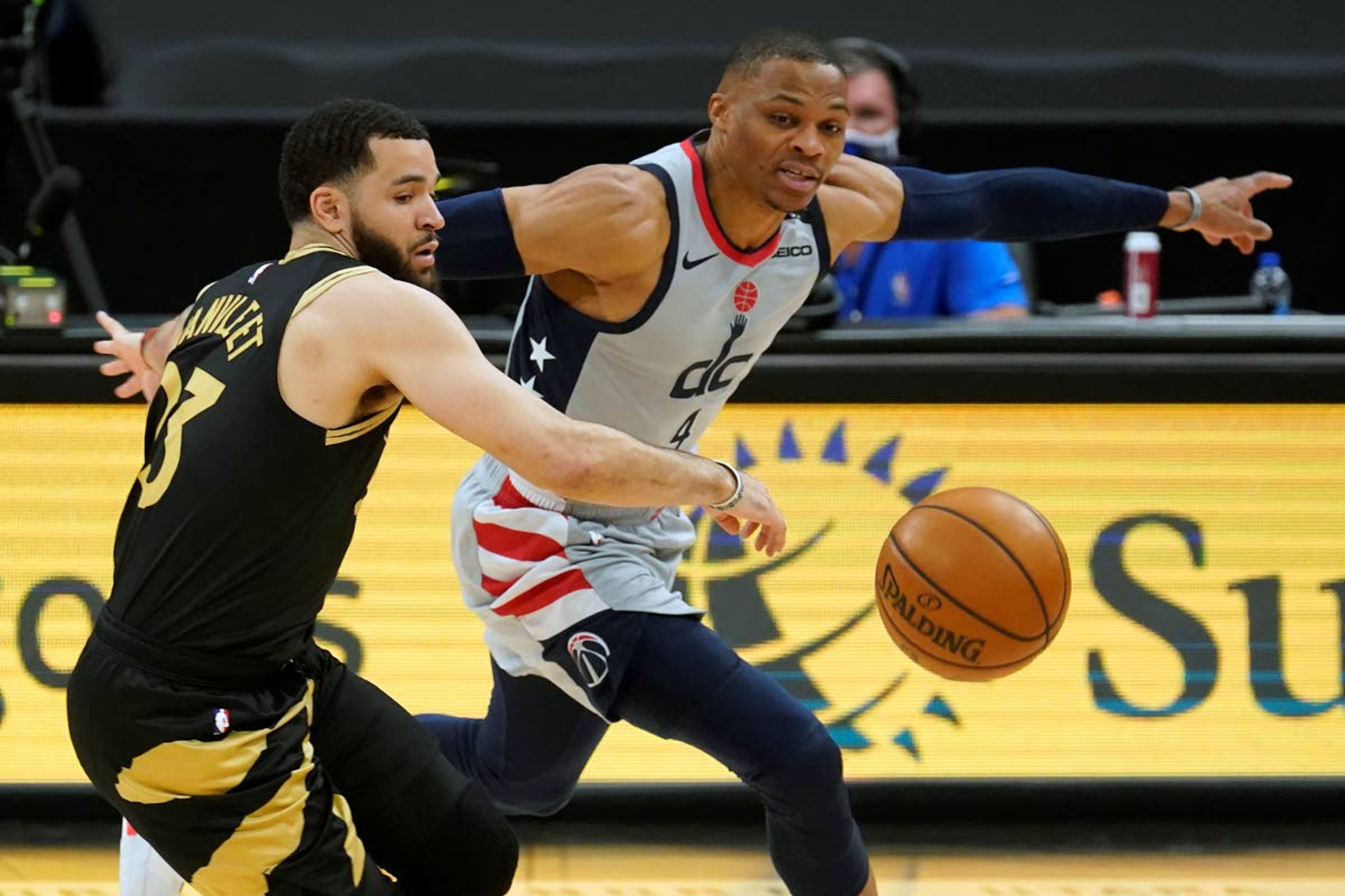 Washington Wizards guard Russell Westbrook (4) steals the ball from Toronto Raptors guard Fred VanVleet (23) during the first half of an NBA basketball game Thursday, May 6, 2021, in Tampa, Fla. (AP Photo/Chris O'Meara)