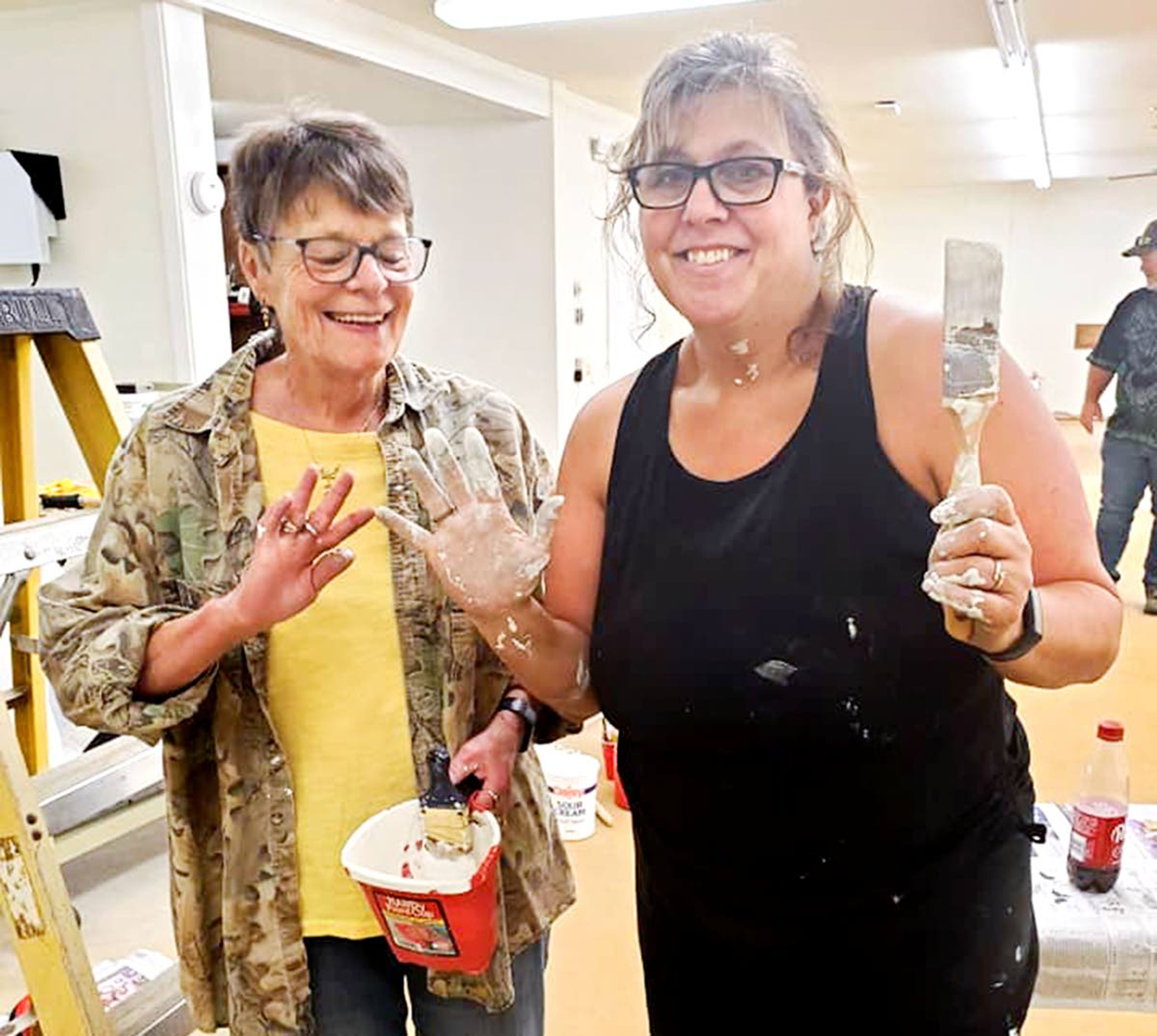 Tonya Delphous is pictured in the middle of working on updates to the Elk River Free Library.