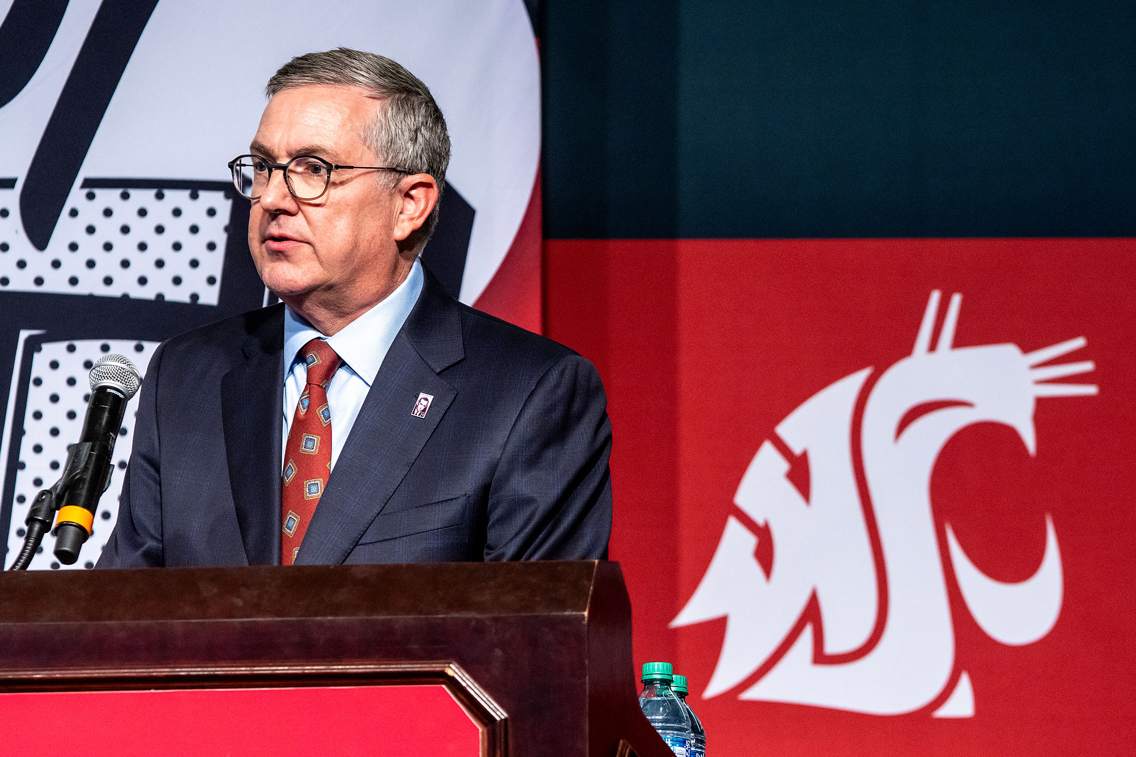 Washington State University Kirk Schulz introduces Dean Baquet at the Murrow Symposium Tuesday in Pullman.