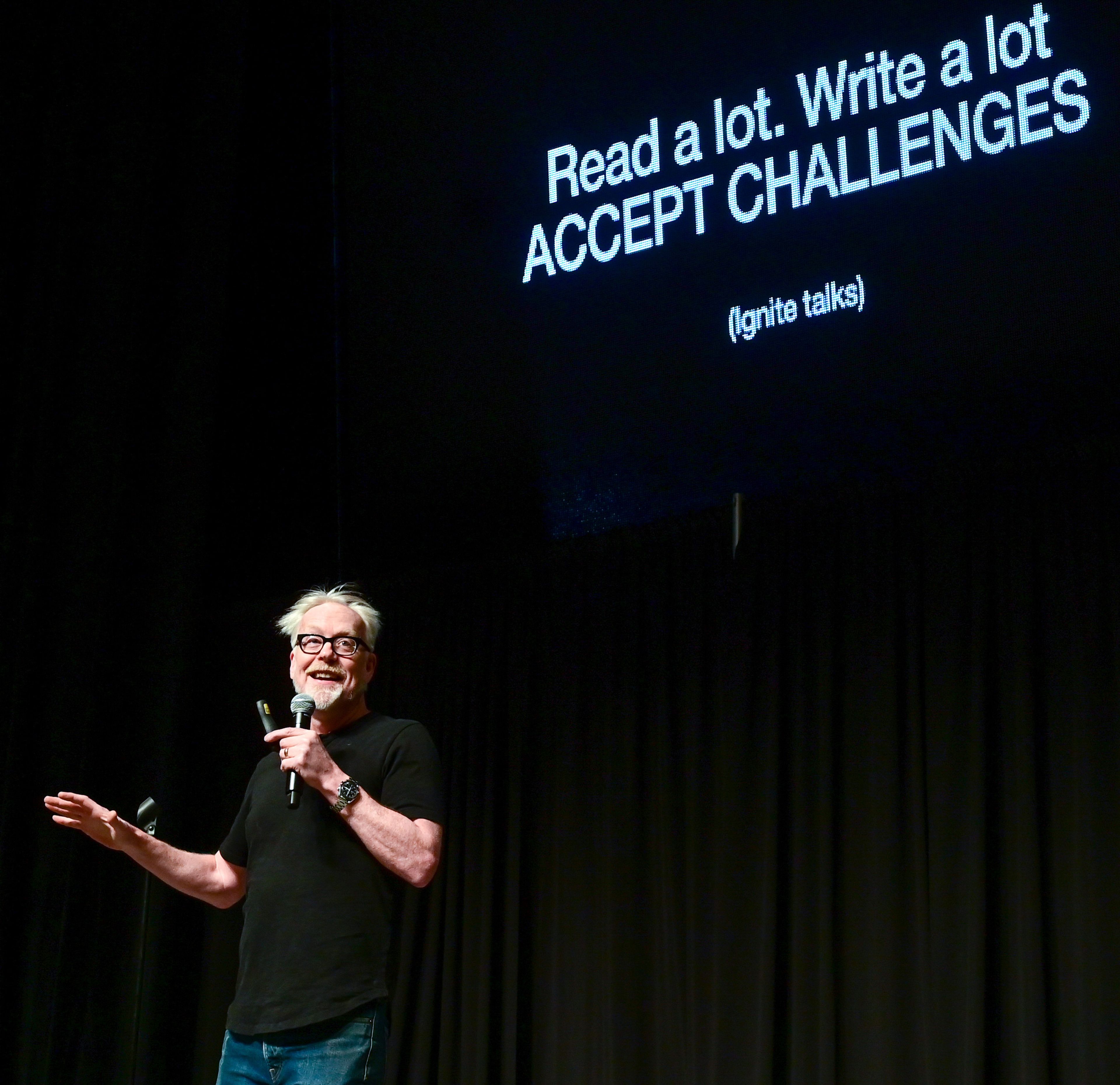 Adam Savage speaks at an Earth Day event hosted at Beasley Coliseum in Pullman on Sunday. The former co-host of "MythBusters" gave a keynote on his work and responded to crowd questions.