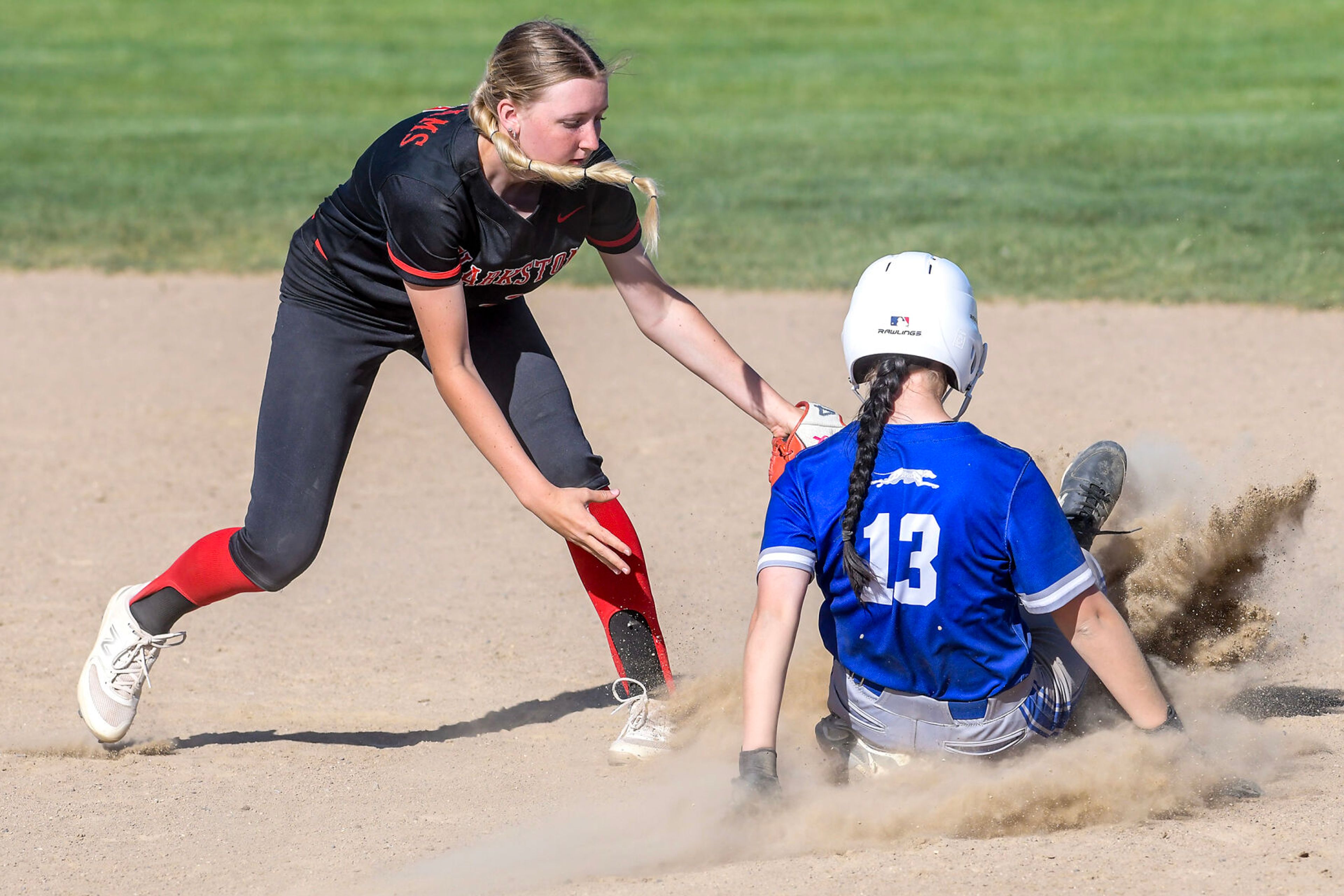 Clarkston’s Aneysa Judy tags out Pullman’s Sammi Turner in an inning of a district tournament semifinal round game Thursday in Clarkston.