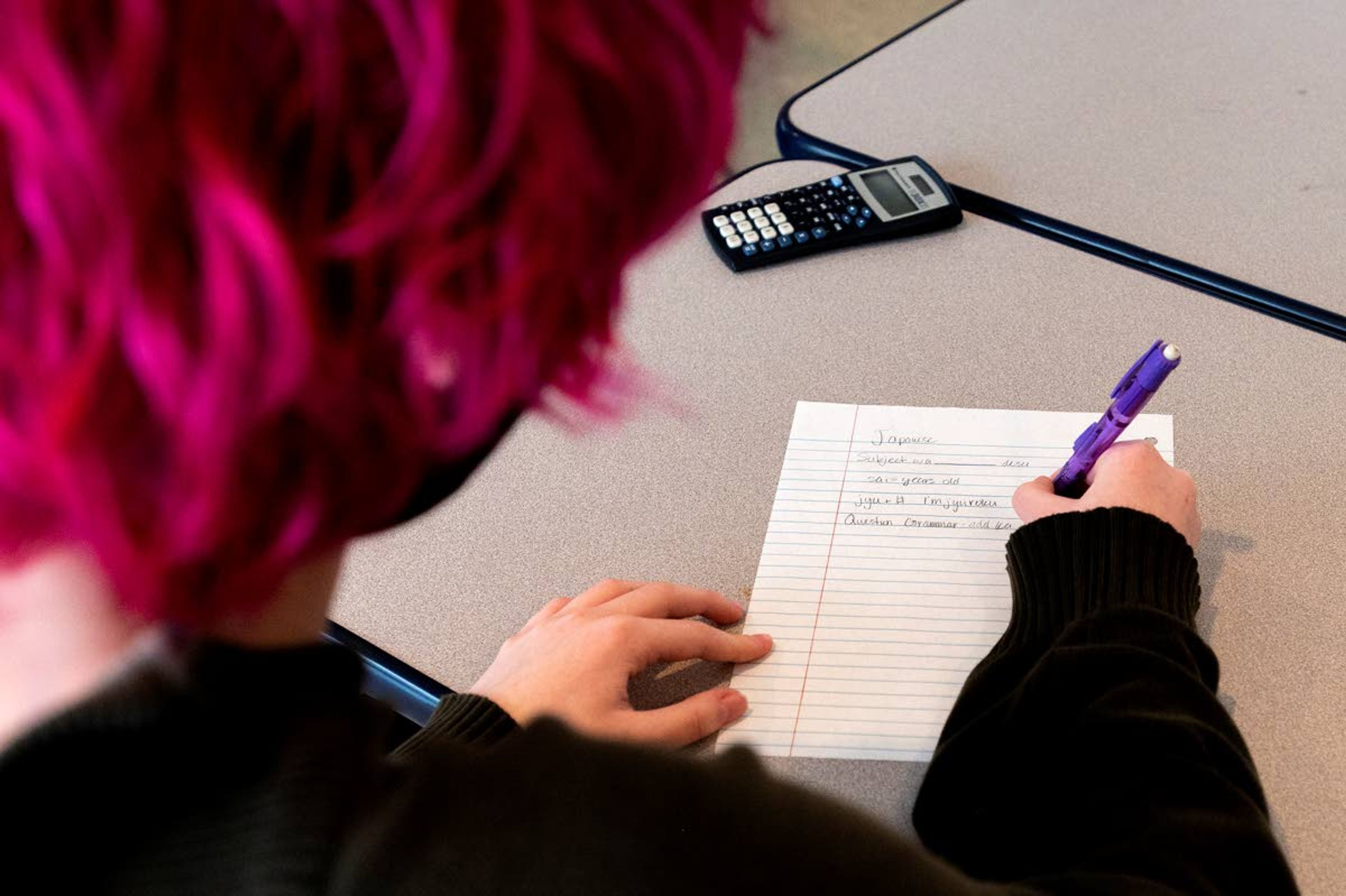 Kat Bradley takes notes Wednesdau while learning Japanese from University of Idaho Japanese Instructor Azusa Tojo at Paradise Creek Regional High School in Moscow.