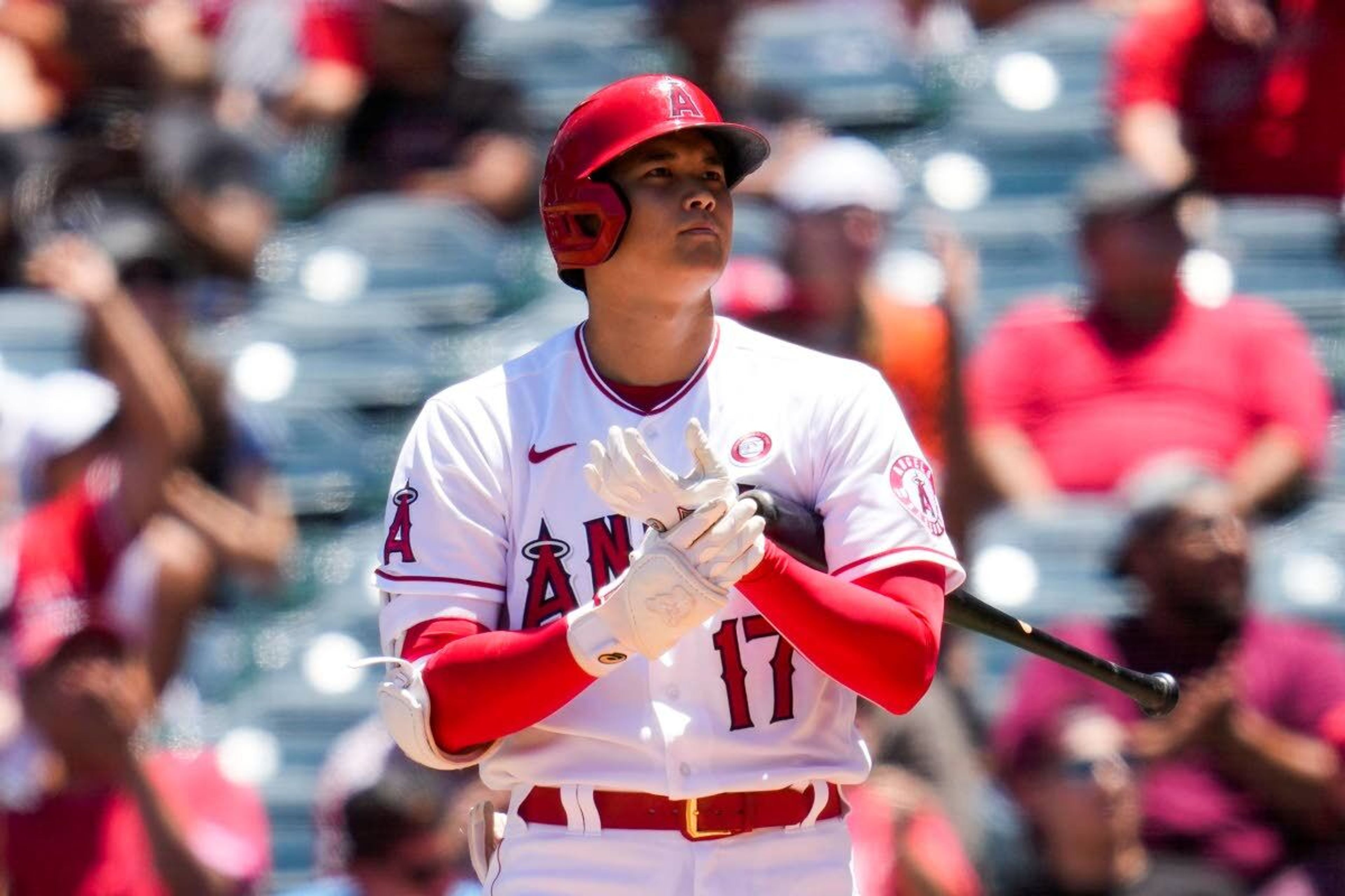 Los Angeles Angels designated hitter Shohei Ohtani (17) reacts after swinging a strike during the first inning of a baseball game against the Baltimore Orioles Sunday, July 4, 2021, in Anaheim, Calif. (AP Photo/Ashley Landis)