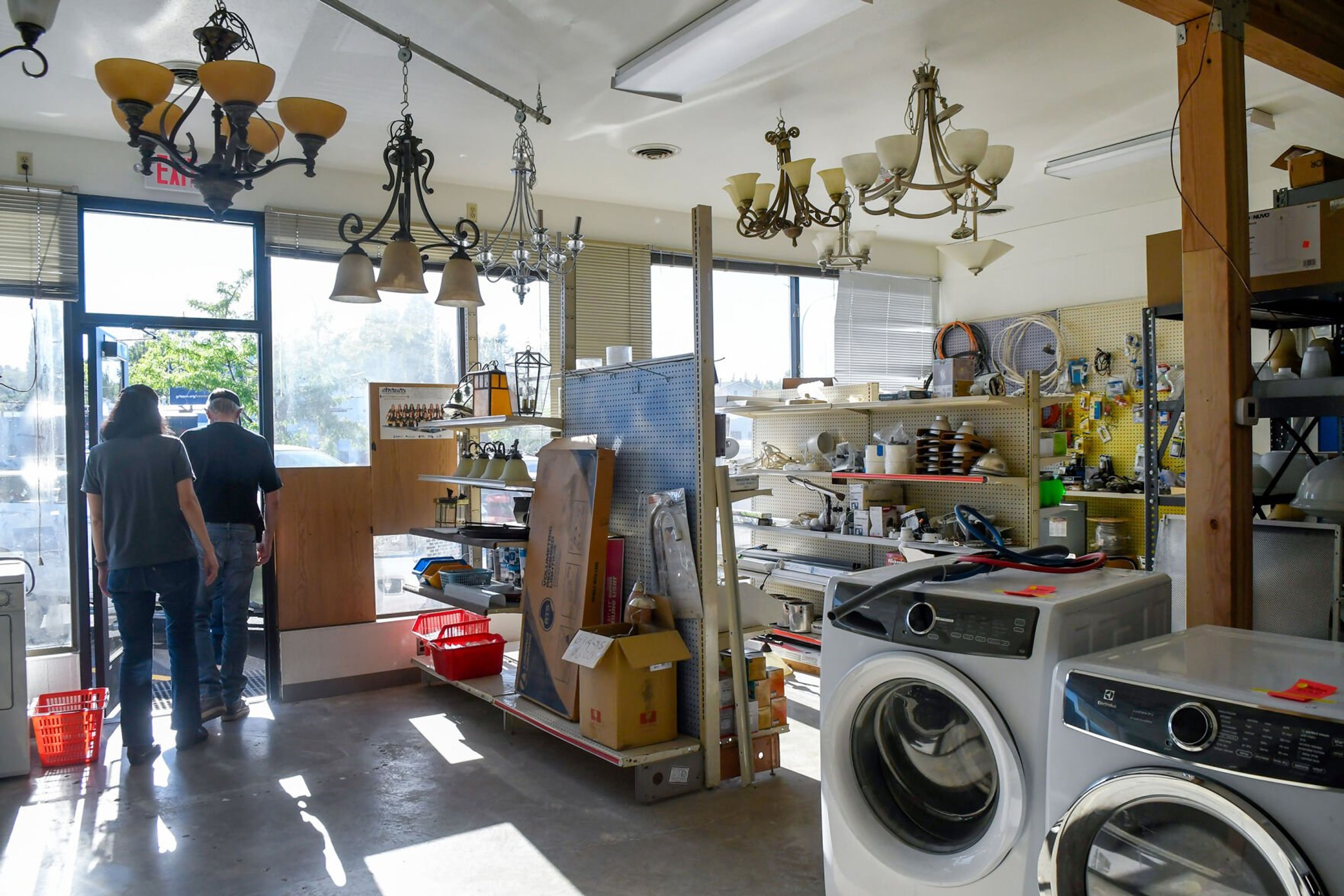 Lighting equipment and other household appliances fill a portion of the finished expansion at the Palouse Habitat for Humanity ReStore during the store’s grand reopening celebration in Moscow on Thursday.