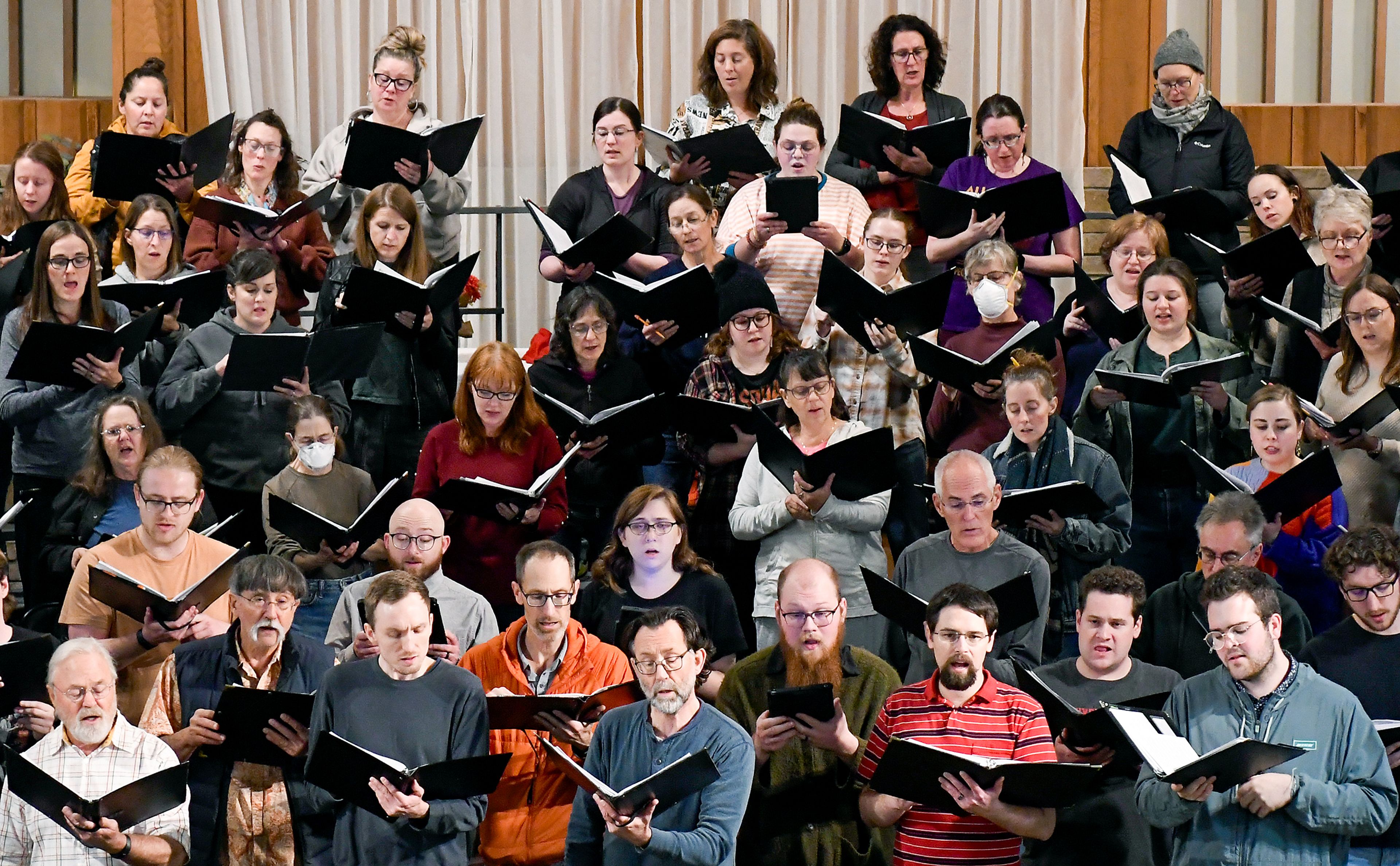 Members of the Palouse Choral Society rehearse Monday before the start of their 25th anniversary season at Simpson United Methodist Church in Pullman.