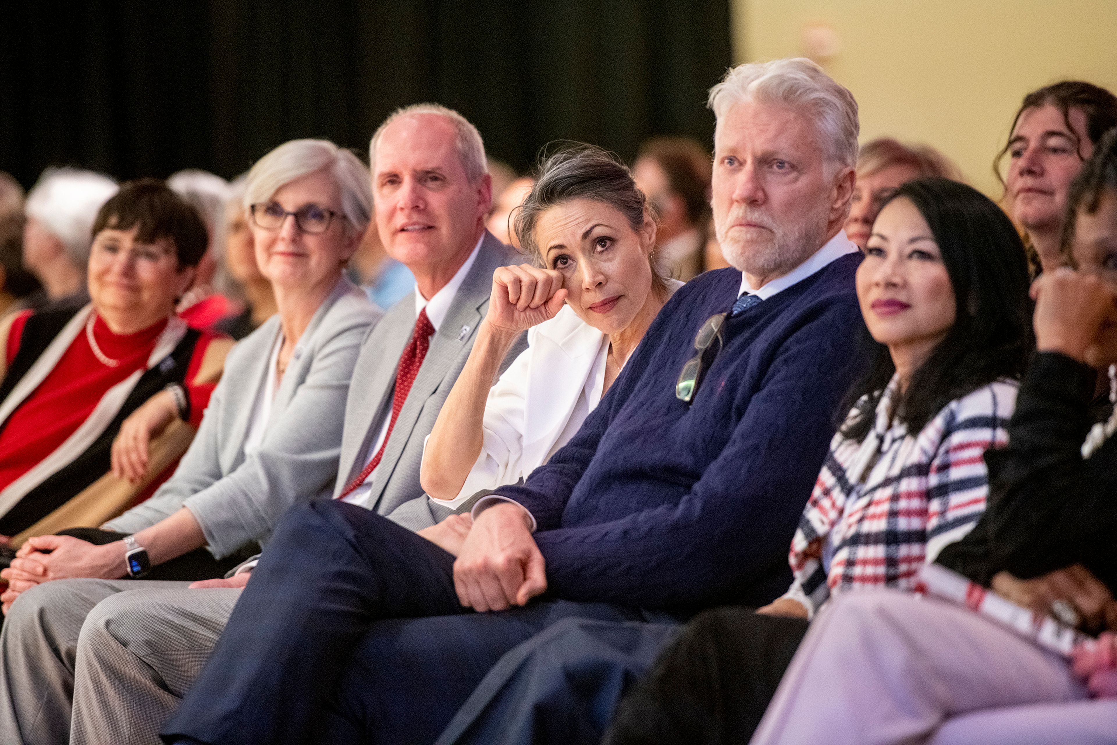 Journalist Ann Curry tears up as she watches her tribute video at the 46th annual Murrow Symposium.