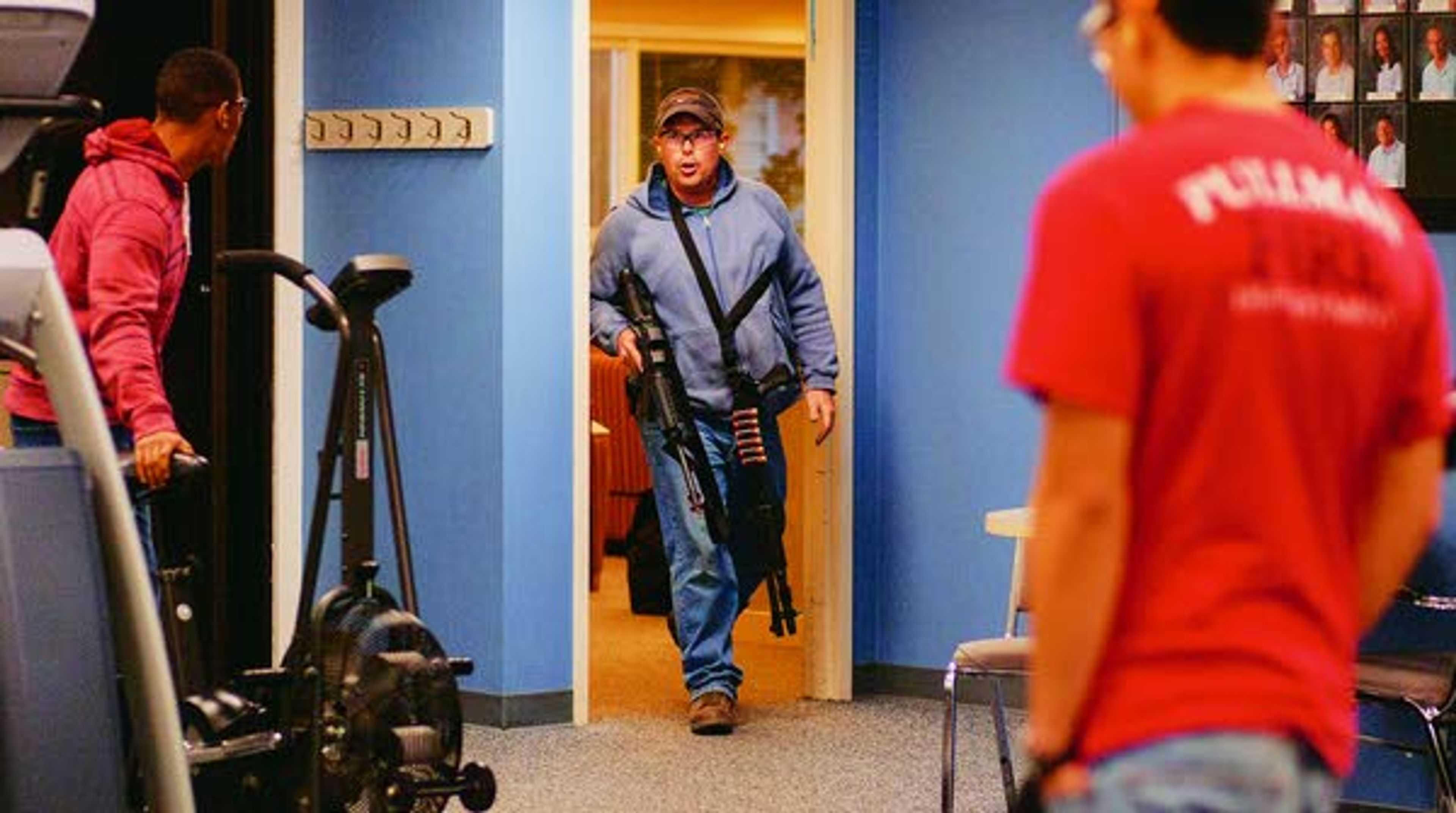 The "shooter," played by Pullman Police Department officer Aaron Breshears, enters the Summit Therapy exercise area during an active shooter response drill run by the PPD on Sunday at Summit Therapy in Pullman.