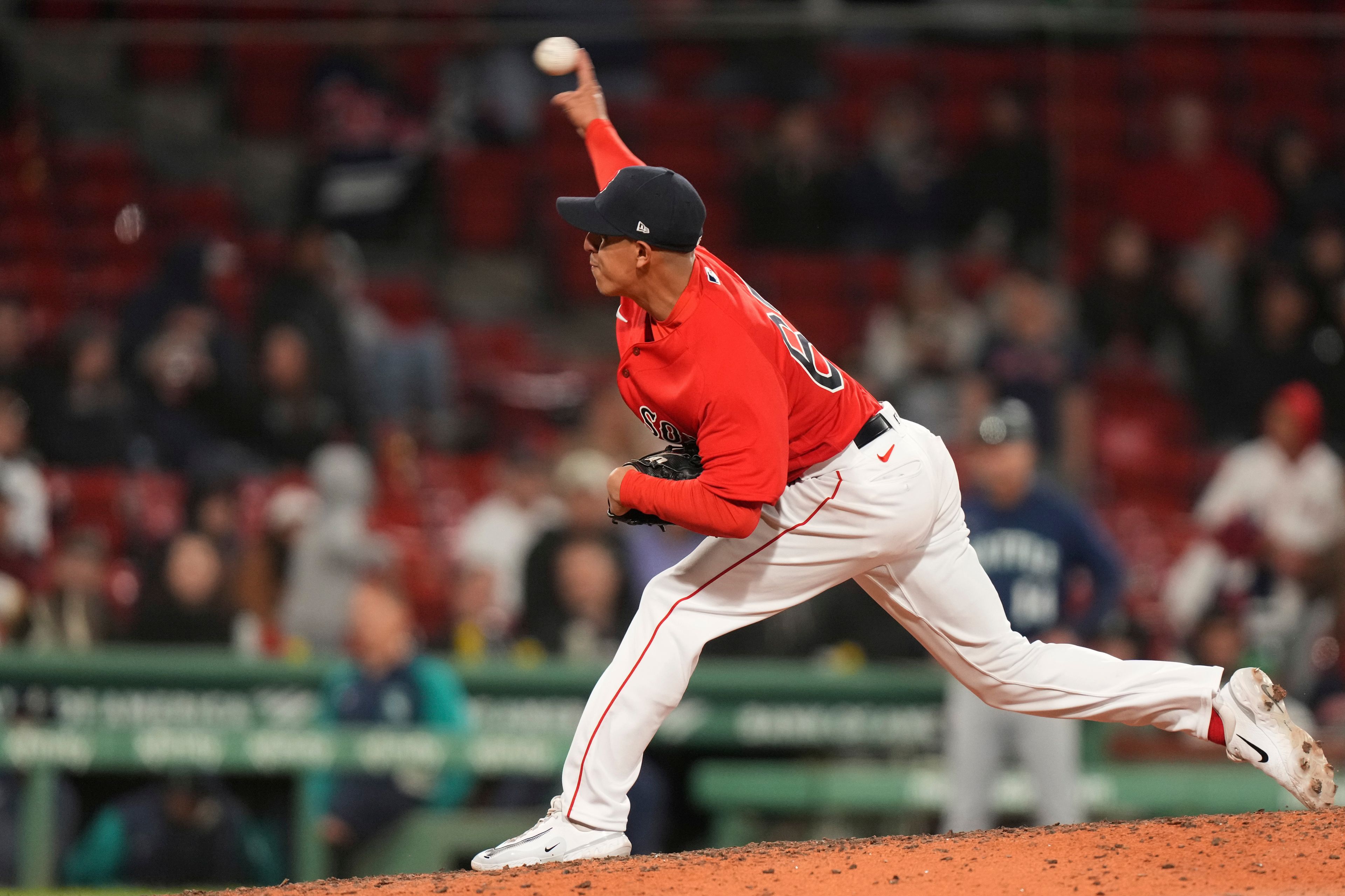 Boston Red Sox's Justin Garza delivers a pitch to a Seattle Mariners player in the ninth inning of a baseball game, Wednesday, May 17, 2023, in Boston. (AP Photo/Steven Senne)