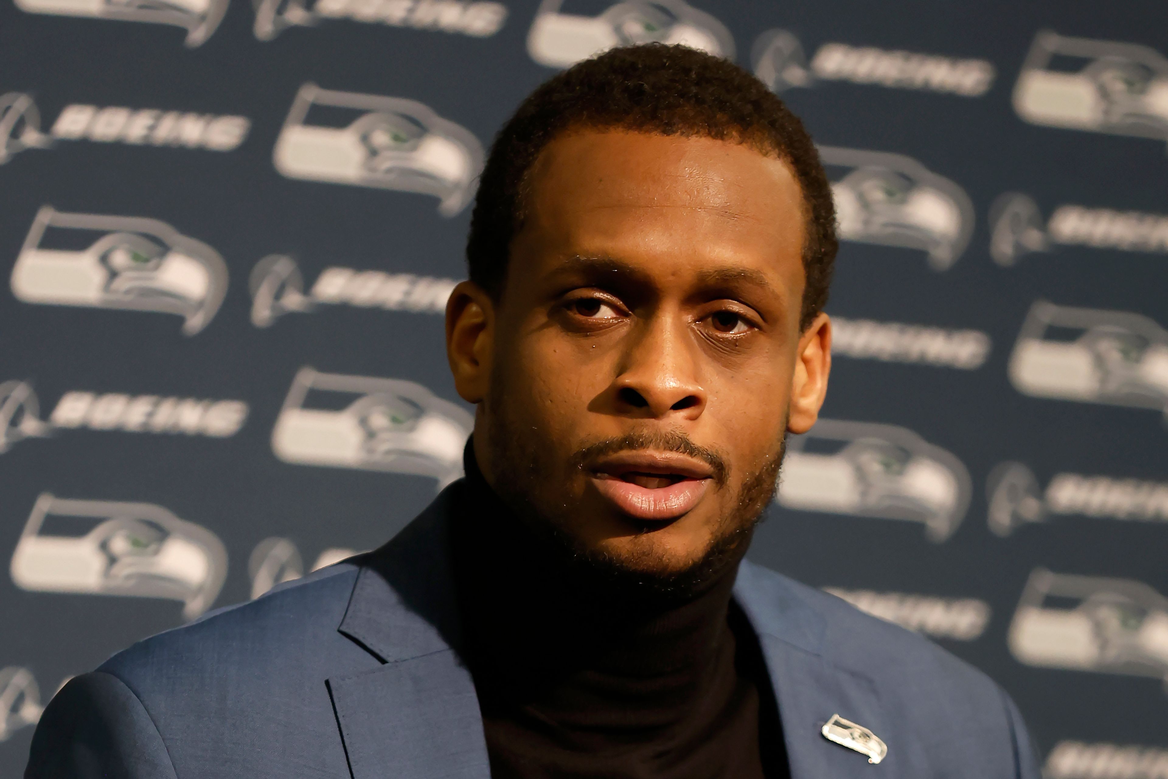 FILE - Seattle Seahawks quarterback Geno Smith speaks at a news conference after an NFL wild card playoff football game against the San Francisco 49ers in Santa Clara, Calif., Saturday, Jan. 14, 2023. Geno Smith finally got to enjoy a day of being in the spotlight after signing the big contract that had eluded most of his career. Smith's three-year contract with the Seahawks will keep him as the presumptive starting quarterback in Seattle following a breakout season. (AP Photo/Josie Lepe, File