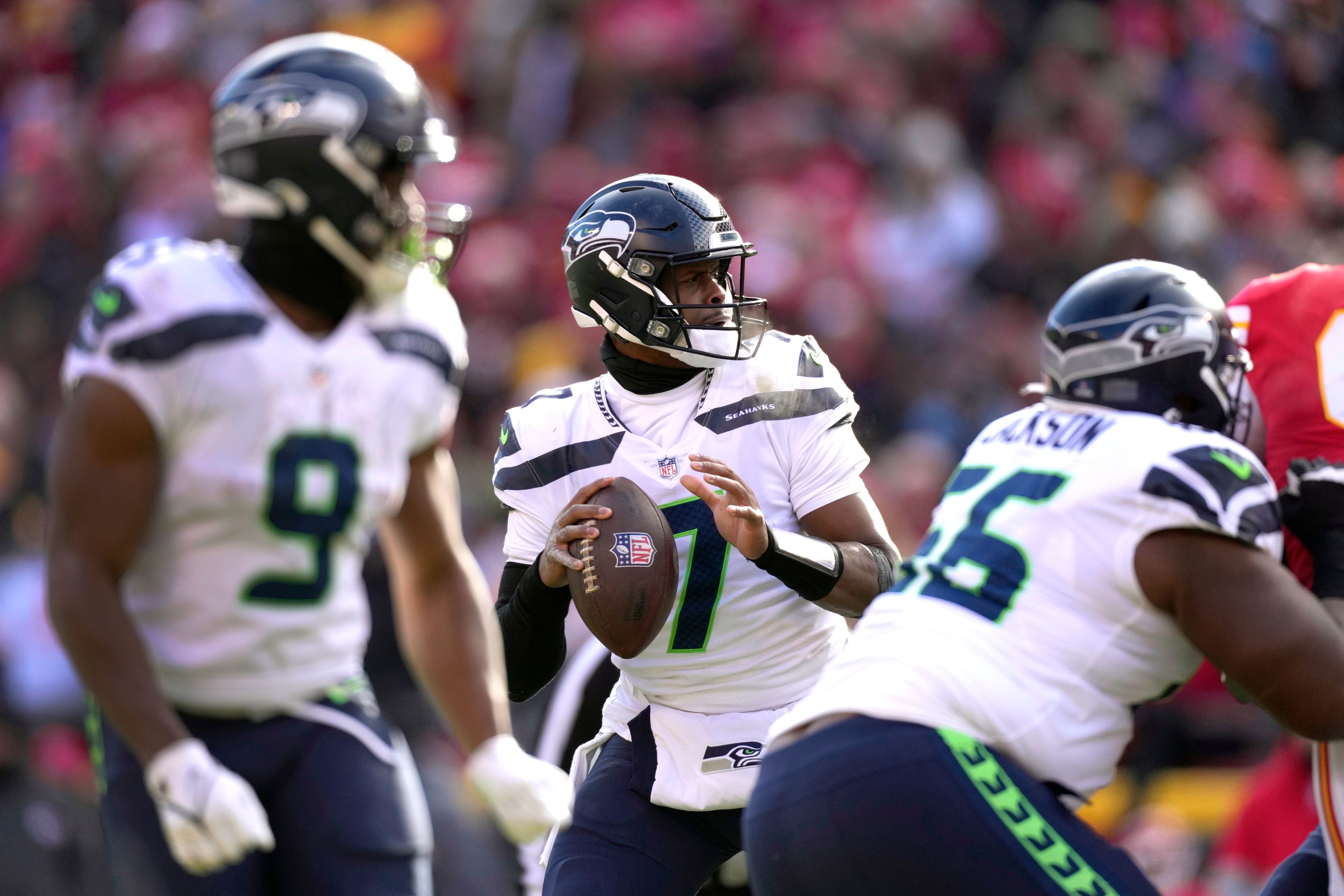 Seattle Seahawks quarterback Geno Smith (7) throws during the first half of an NFL football game against the Kansas City Chiefs Saturday, Dec. 24, 2022, in Kansas City, Mo. (AP Photo/Charlie Riedel)