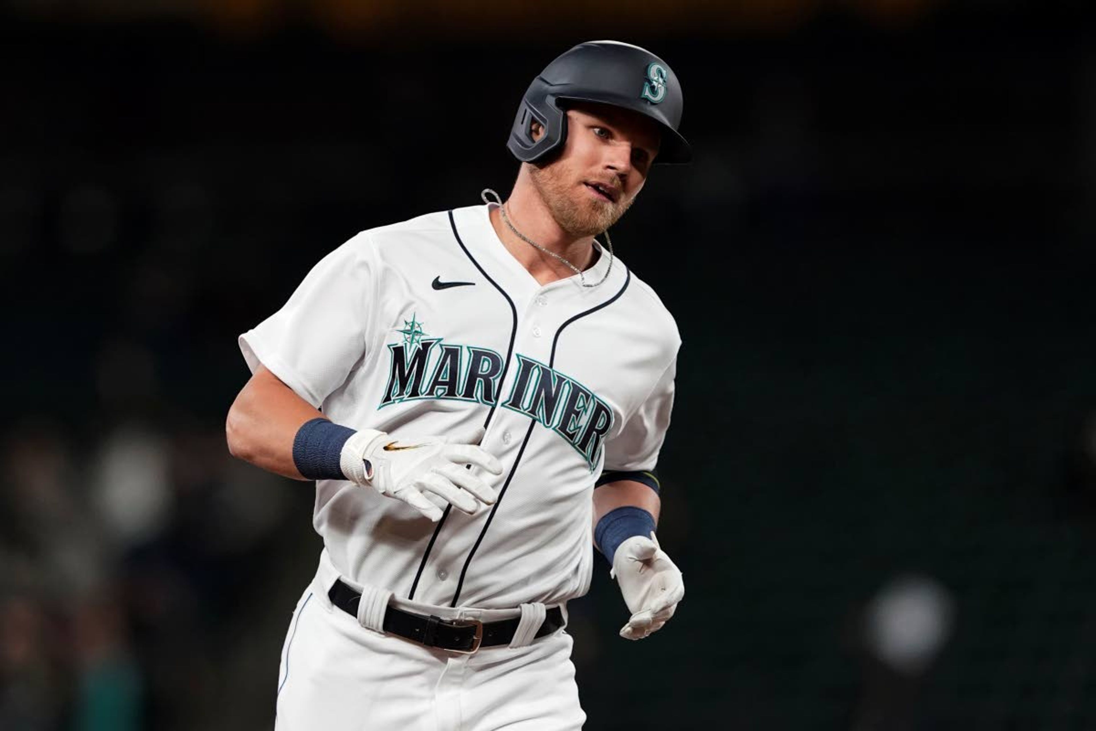 Seattle Mariners' Jake Bauers rounds the bases after he hit a go-ahead solo home run against the Minnesota Twins during the eighth inning of a baseball game, Monday, June 14, 2021, in Seattle. The Mariners won 4-3. (AP Photo/Ted S. Warren)