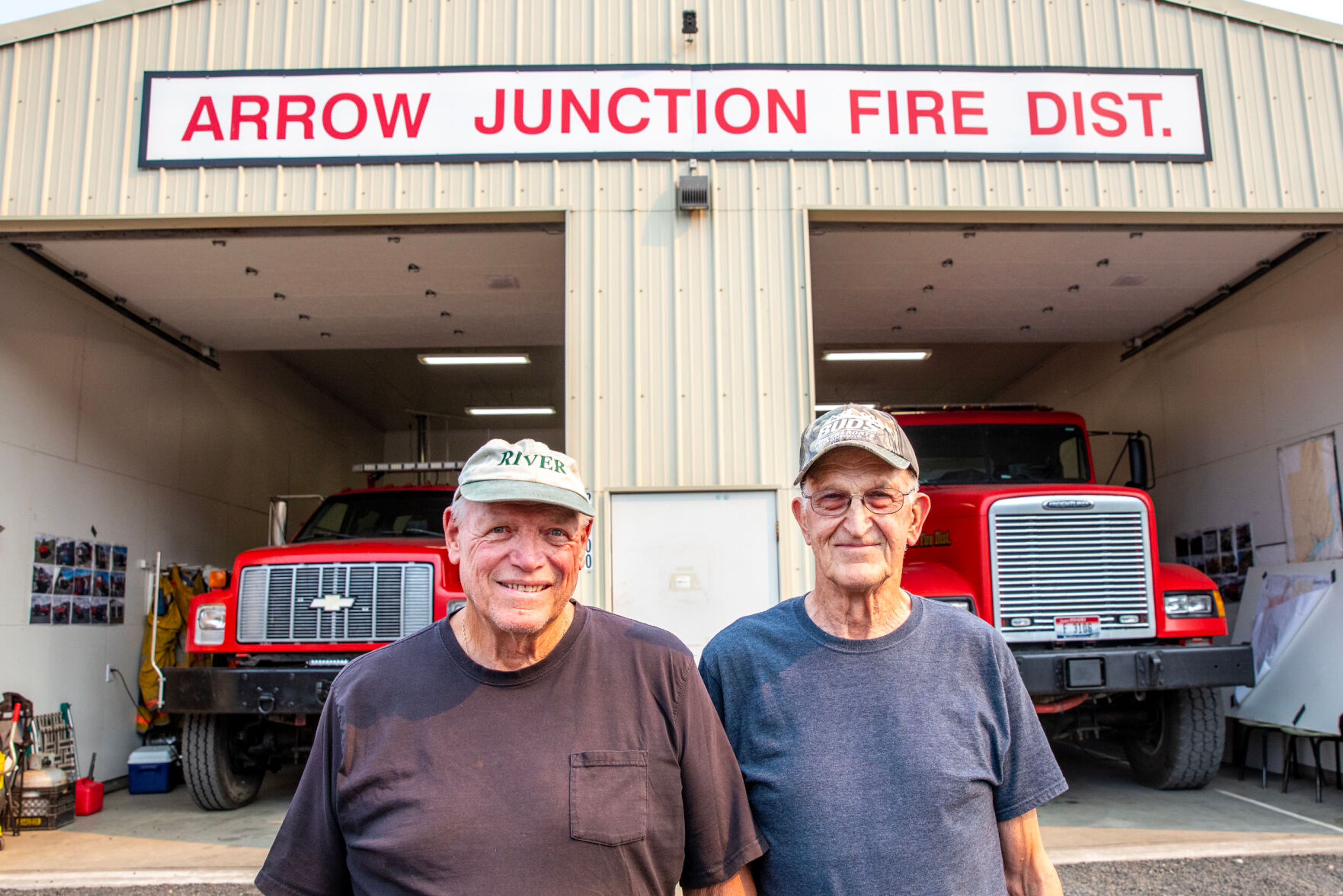 LuVerne Grussing, left, and Gene Wightman stand outside the Arrow Junction Fire Protection District Friday for a photo.