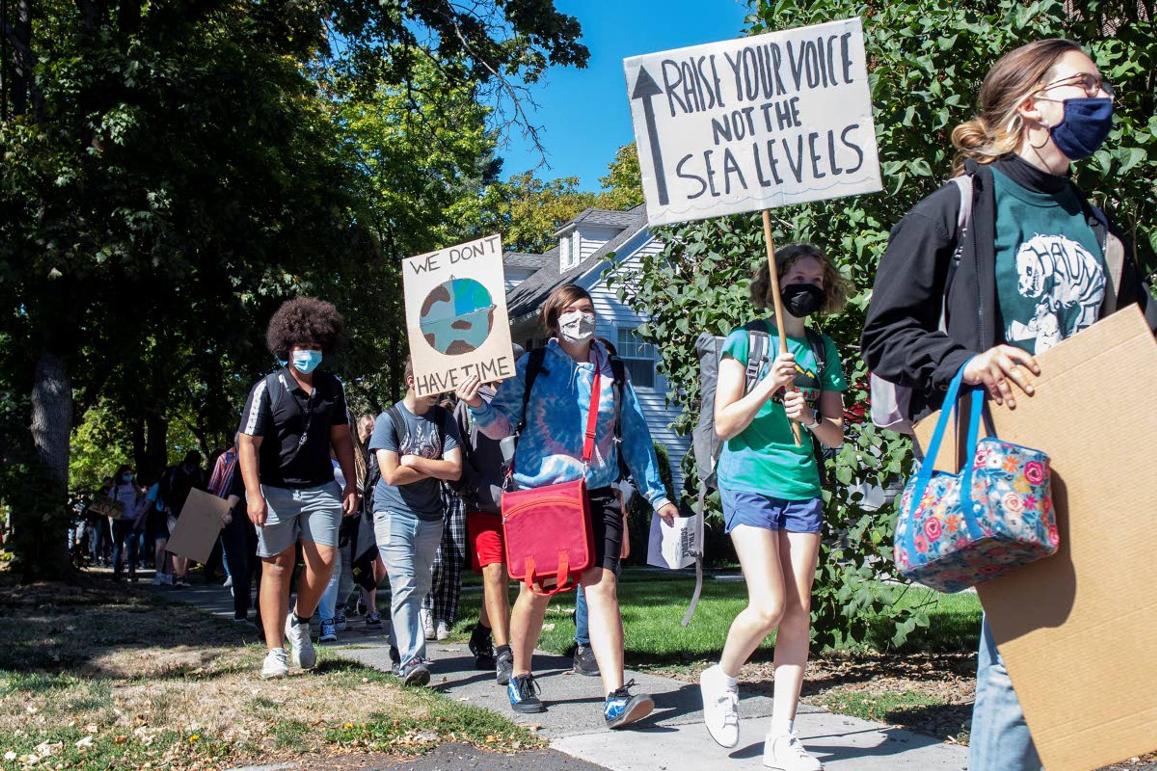 Students from Moscow High School participate in Global Walkout Day as they march to East City Park as part of the Fridays for Future strike to advocate for 100 percent renewable energy in Moscow on Friday morning.