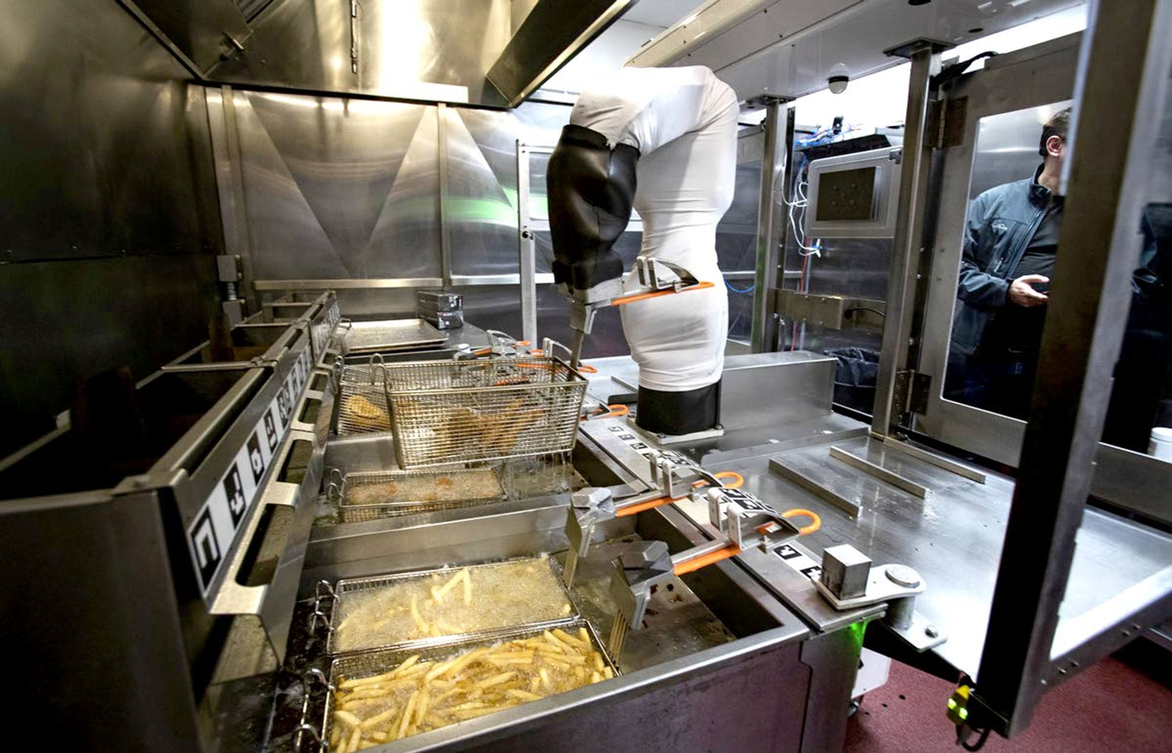 Flippy the robot demonstrates its ability to man a fry station in January at Miso Robotics in Pasadena, Calif.