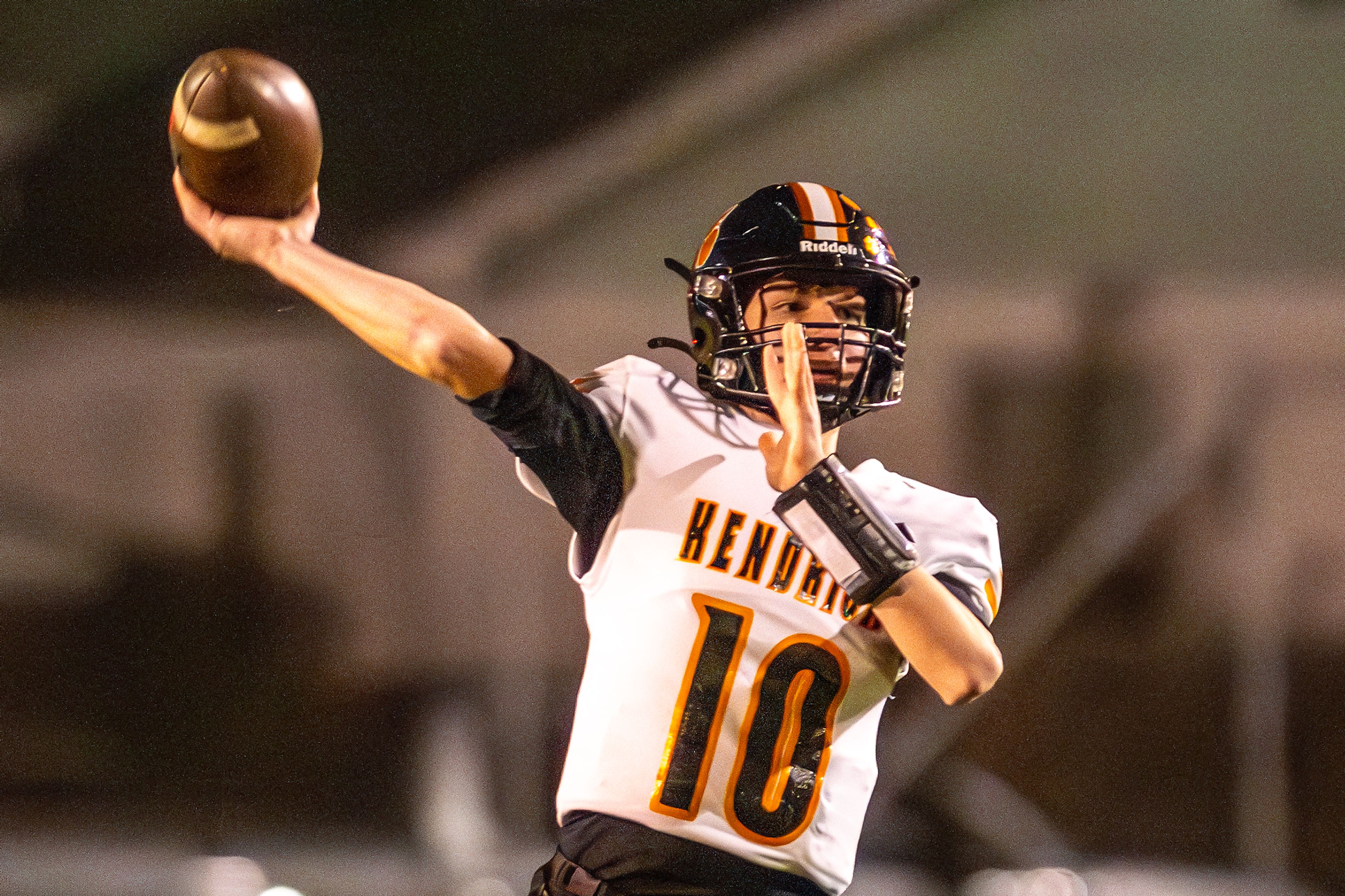 Kendrick quarterback Maddox Kirkland throws a pass against Logos in a semifinal game of the Idaho State Football Class 2A Championships Friday at Bengal Field in Lewiston.