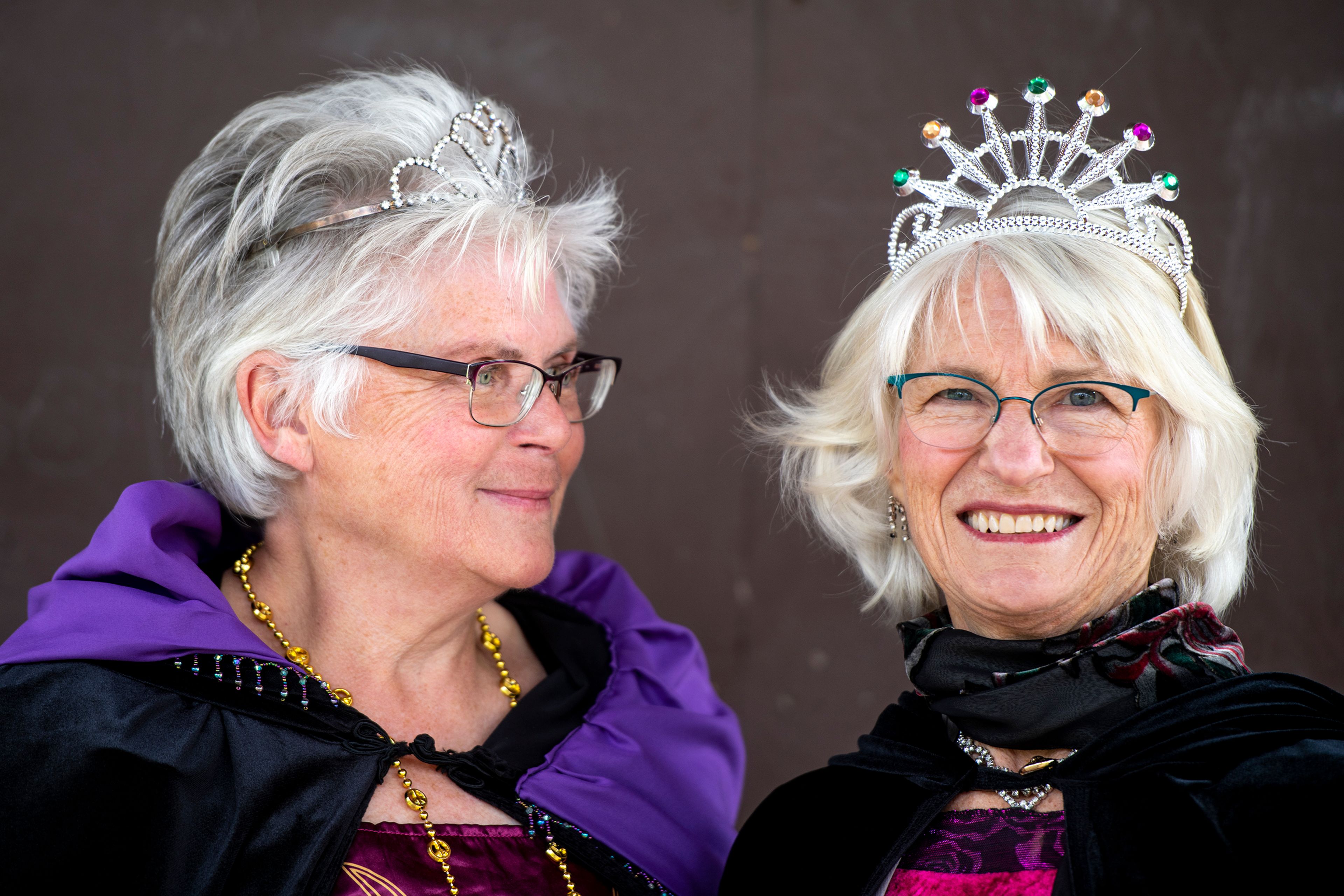 Rebecca Rod, left, looks at Theresa Beaver while dressed in their royal attire as queens of this weekend’s Renaissance Fair at East City Park in Moscow. Beaver and Rod said this will be their first time as members of the royal.