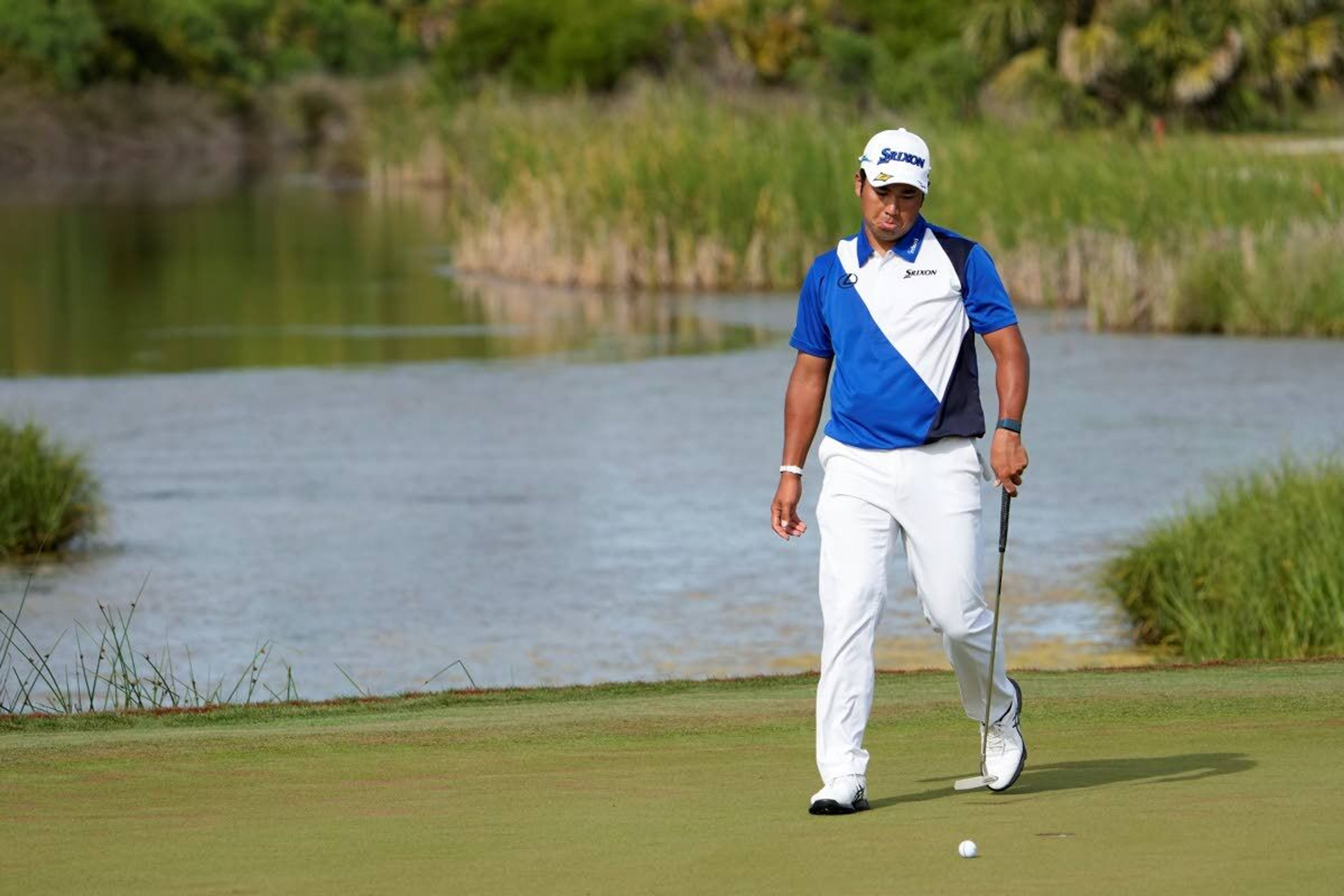 Hideki Matsuyama, of Japan, misses a putt for par on the 12th green during the third round at the PGA Championship golf tournament on the Ocean Course, Saturday, May 22, 2021, in Kiawah Island, S.C. (AP Photo/David J. Phillip)